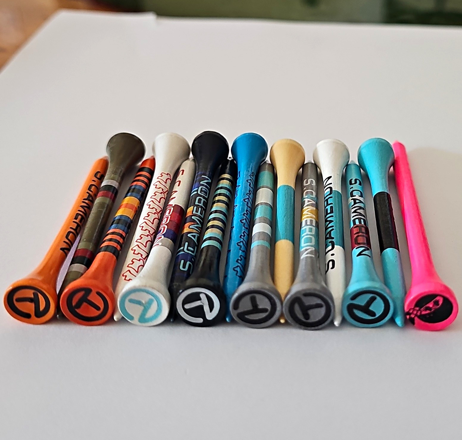 New Scotty Cameron Collectible Tee Lot (15). All Different, Includes 1 Pink M&G New Scotty Cameron Collectible Tee Lot (15). All Different, Includes 1 Pink M&G