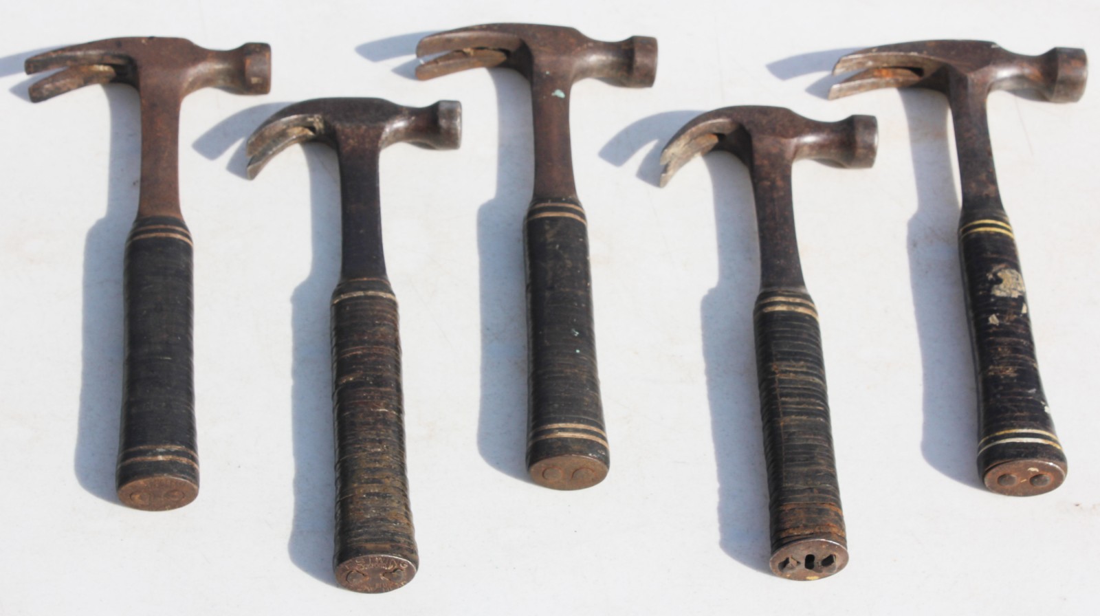 5 Vintage Stacked Leather Estwing Claw Hammers