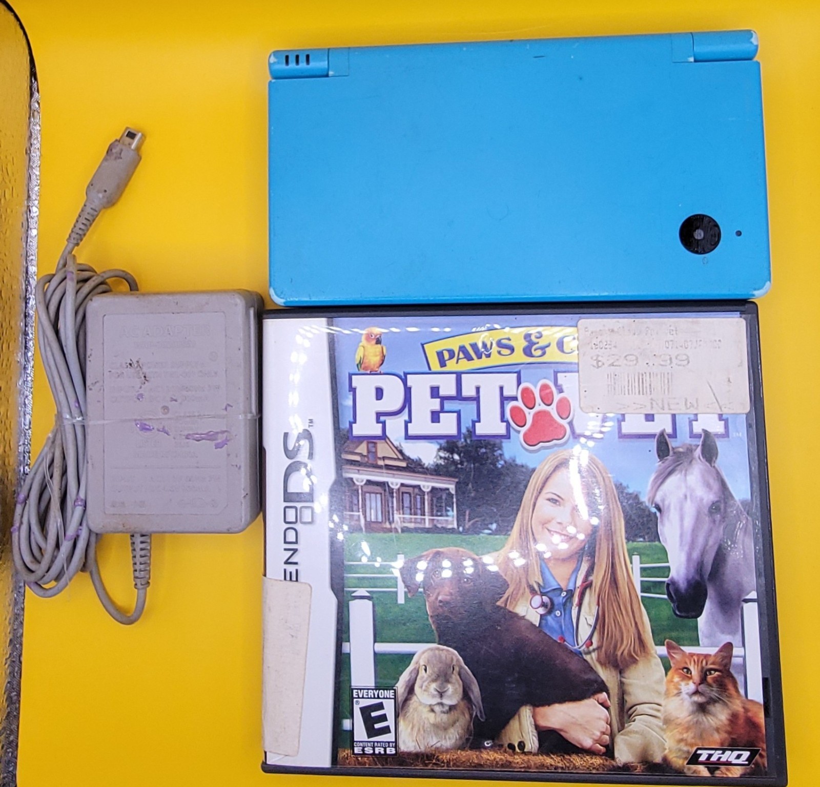 Nintendo DSi Blue Handheld System Console TWL-001 W/ Charger & Game Tested, Used Nintendo DSi Blue Handheld System Console TWL-001 W/ Charger & Game Tested, Used
