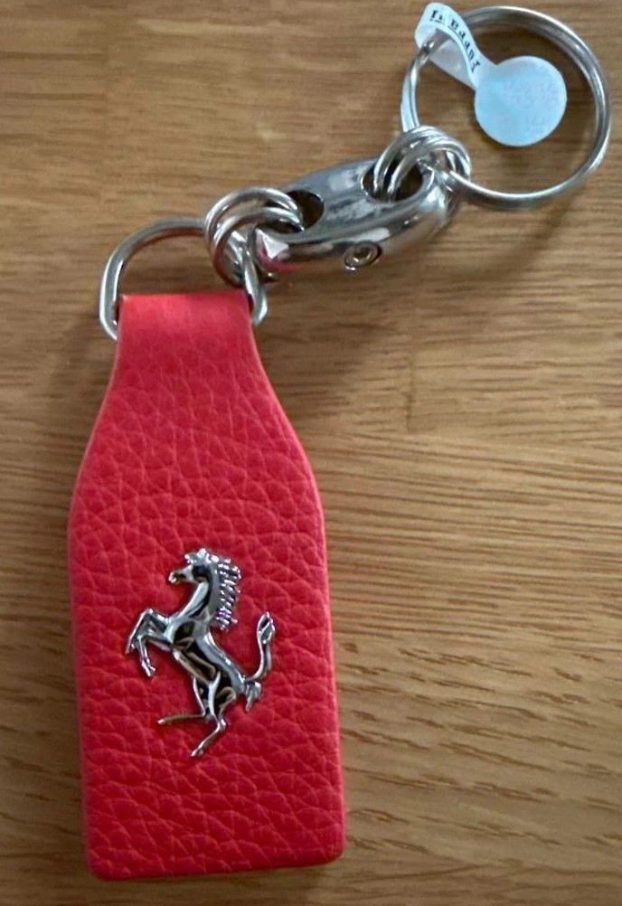 ** SEALED ** Official Ferrari red keychain ** SEALED ** Official Ferrari red keychain