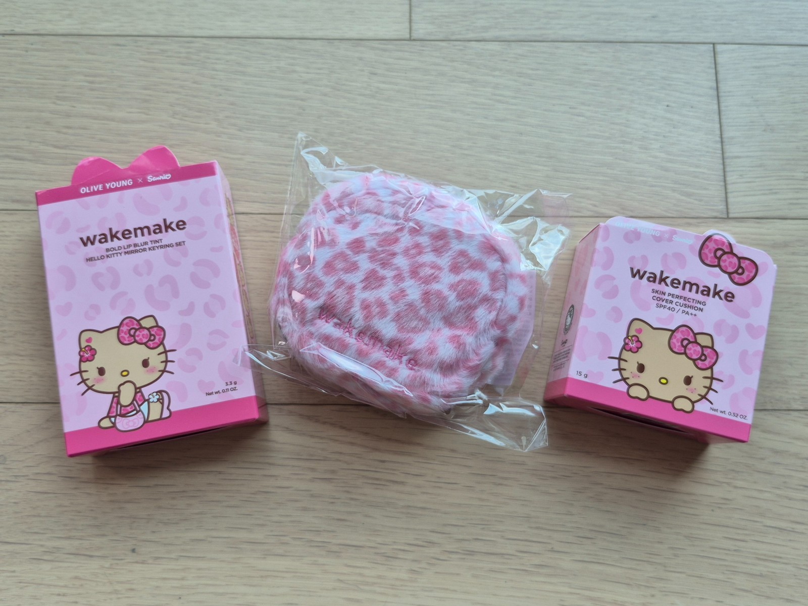 Sanrio Hello Kitty x Olive Young WAKEMAKE Leopard Cushion Tint Keyring Pouch Set