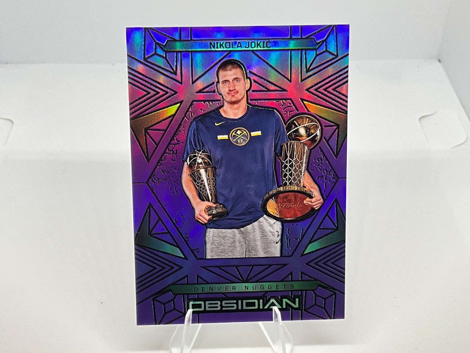 2024-2025 Panini Obsidian - Nikola Jokic Purple Flood /75 - Denver Nuggets 2024-2025 Panini Obsidian - Nikola Jokic Purple Flood /75 - Denver Nuggets
