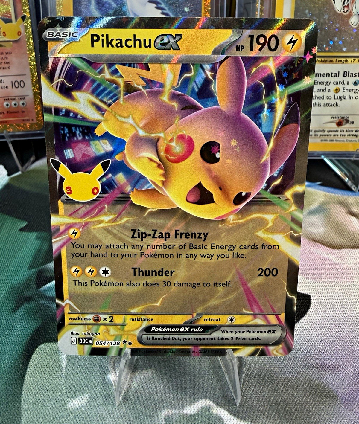 The Pokémon Company Pikachu ex Me: 30th Celebration Holo Full Art DR 054/128 The Pokémon Company Pikachu ex Me: 30th Celebration Holo Full Art DR 054/128