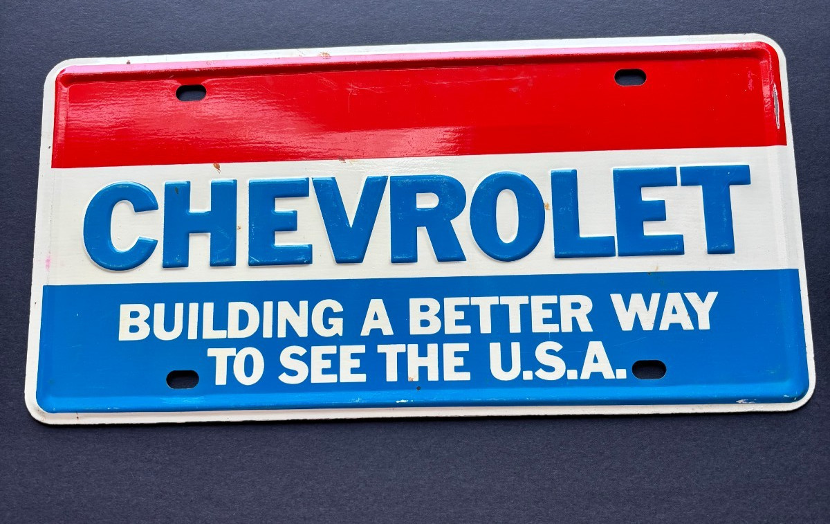 NOS Vintage Heavy Metal Steel Chevy License Plate BUILDING A BETTER WAY U.S.A.