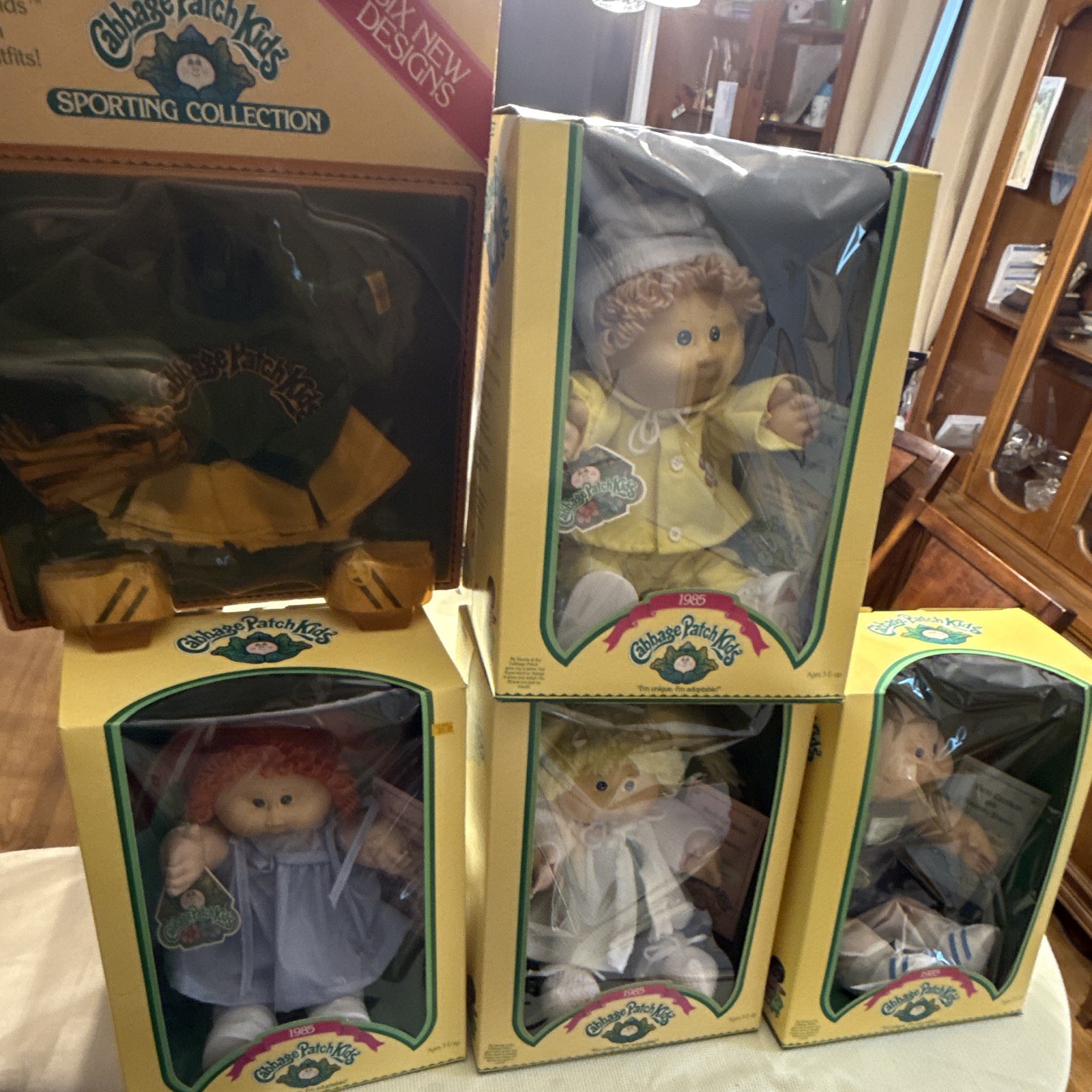 Vintage 1985 Cabbage Patch Kids Lot 4 NRFB Boxed Dolls + Sealed Cheer Outfit Vintage 1985 Cabbage Patch Kids Lot 4 NRFB Boxed Dolls + Sealed Cheer Outfit
