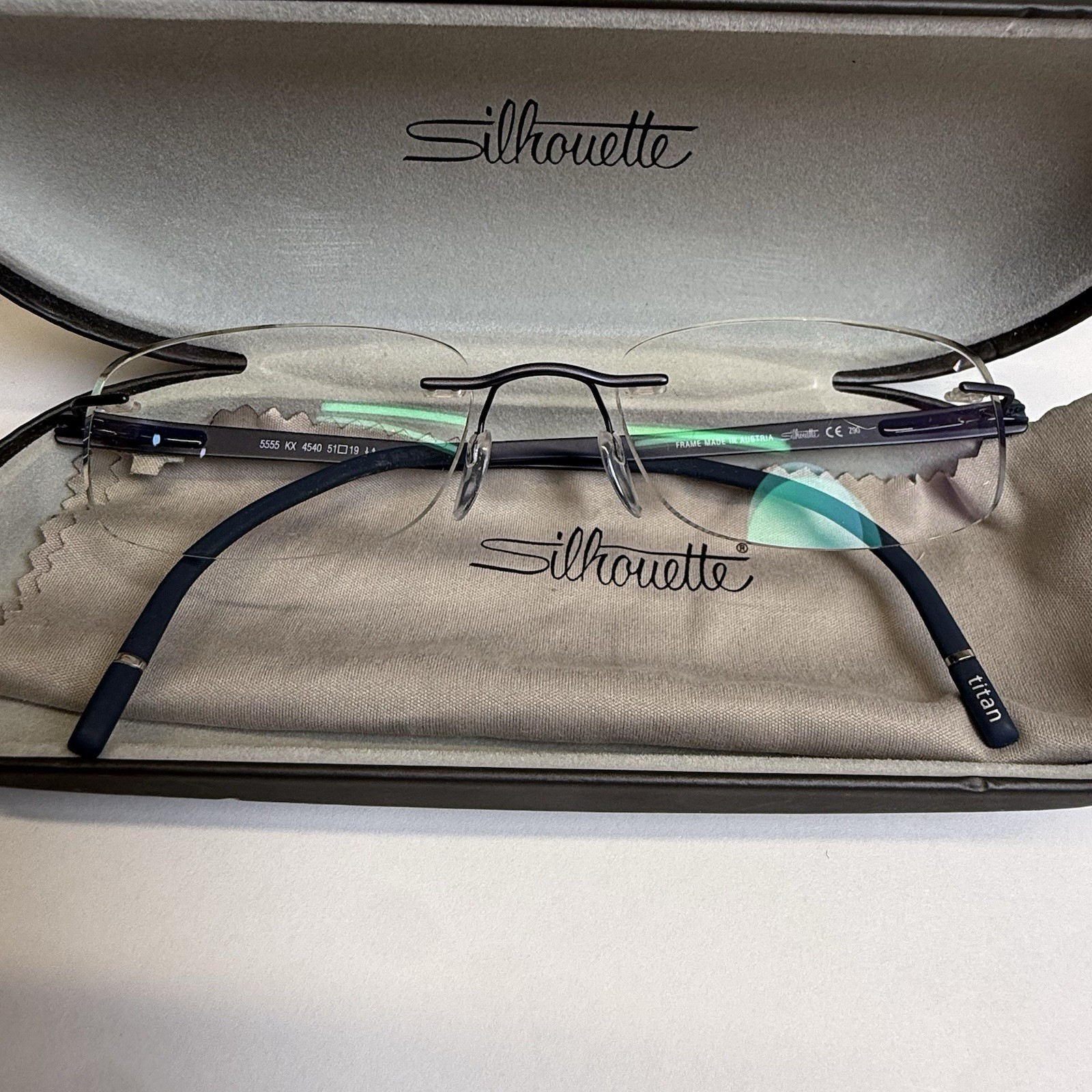 Silhouette 5555 KX 4540 51-19 Titan Silver/Blue Rimless Frames 145 Eyeglasses Silhouette 5555 KX 4540 51-19 Titan Silver/Blue Rimless Frames 145 Eyeglasses