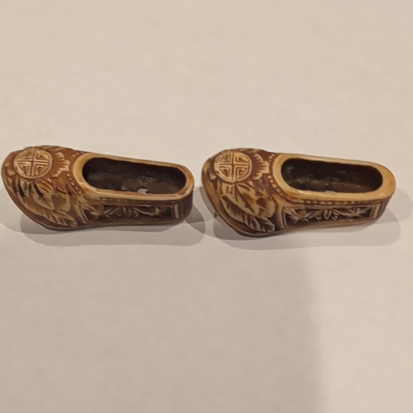Pair of vintage Chinese hand-carved lychee wood miniature shoes Pair of vintage Chinese hand-carved lychee wood miniature shoes