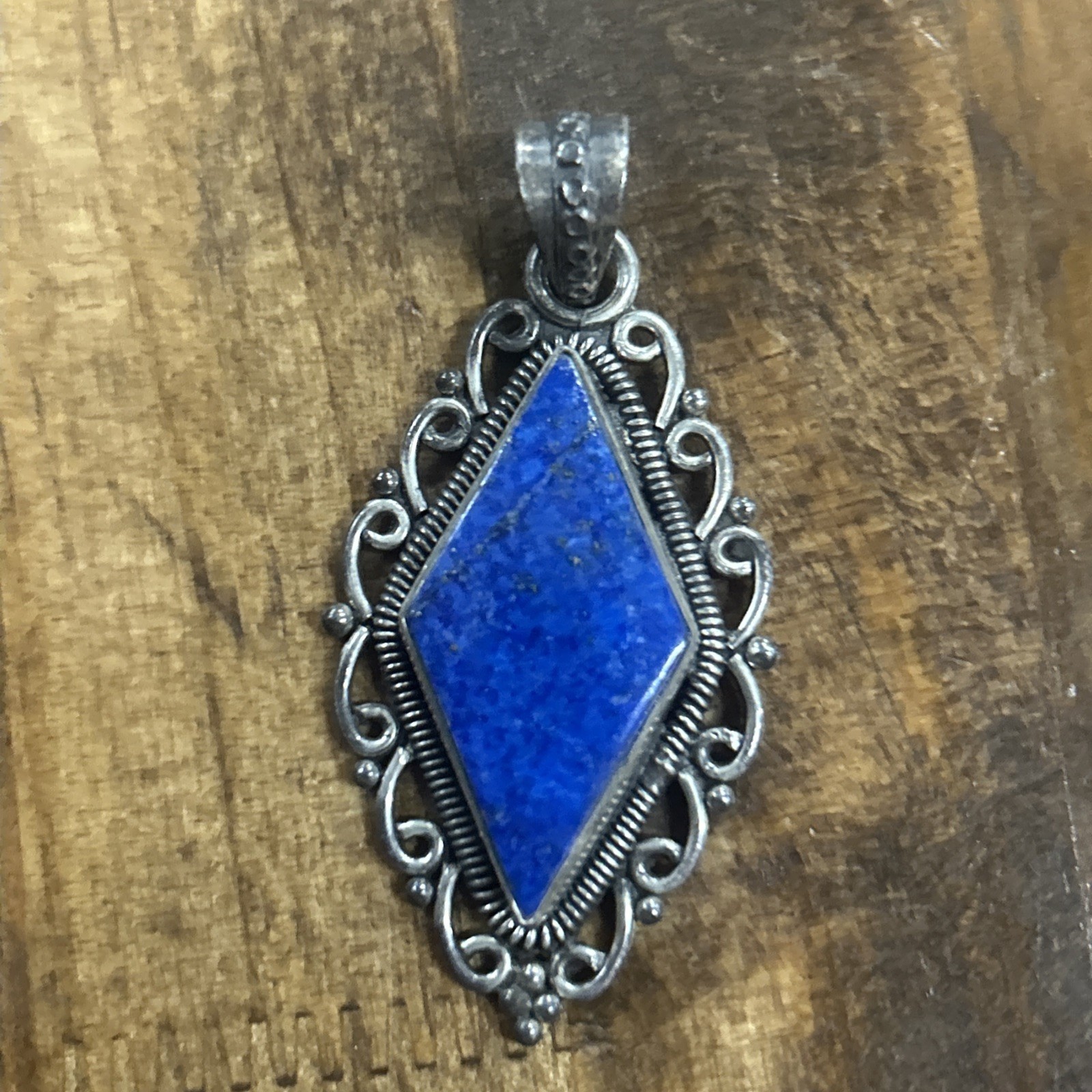 Sterling Silver Diamond Shaped Lapis Lazuli Pendant 9.78 Grams Sterling Silver Diamond Shaped Lapis Lazuli Pendant 9.78 Grams