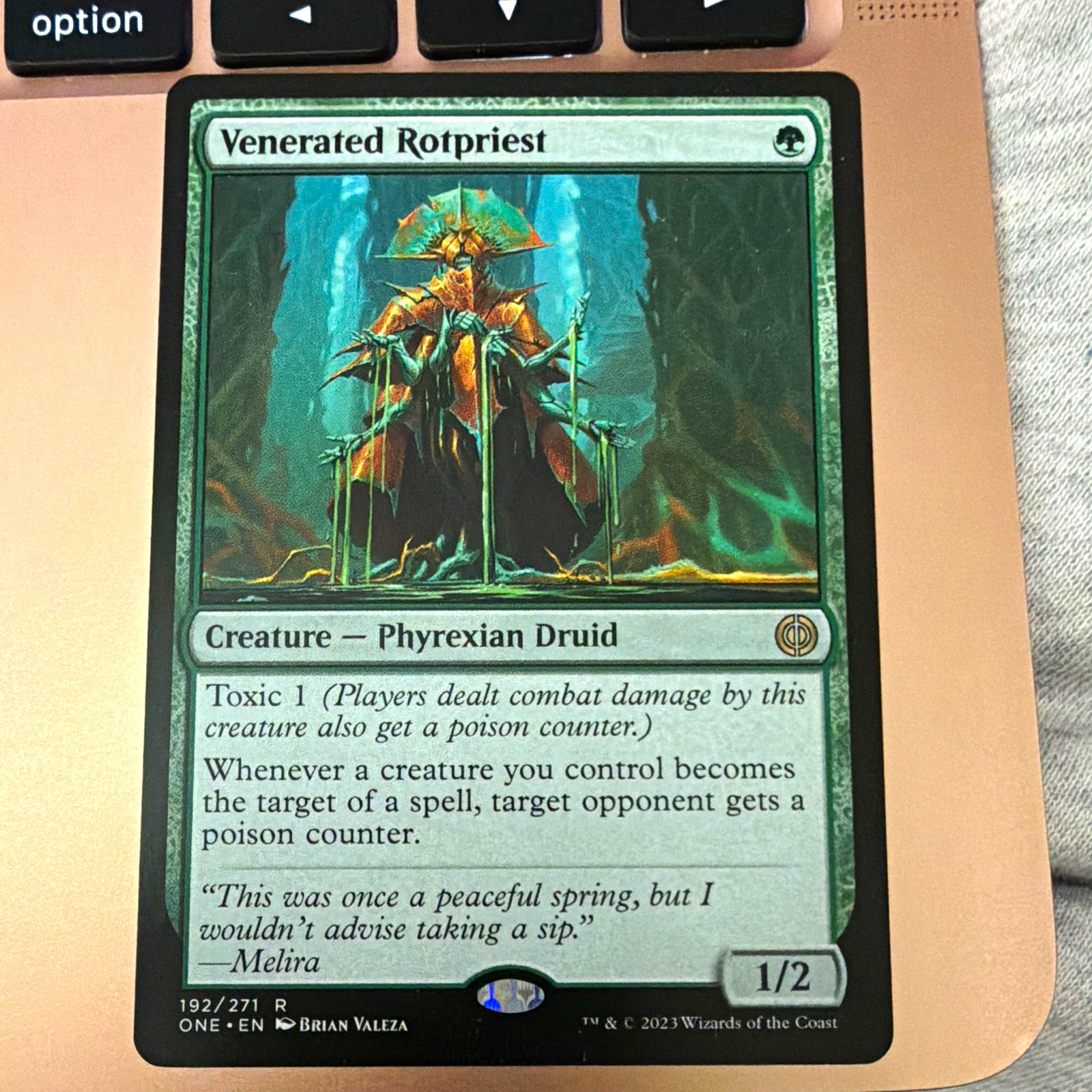 Wizards of the Coast Venerated Rotpriest ONE Regular Rare #192 English Green mtg Wizards of the Coast Venerated Rotpriest ONE Regular Rare #192 English Green mtg