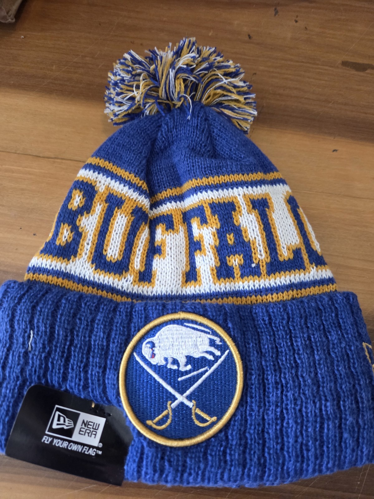 BUFFALO SABRES NHL NEW ERA BLUE & GOLD KNIT BEANIE. NEW BUFFALO SABRES NHL NEW ERA BLUE & GOLD KNIT BEANIE. NEW