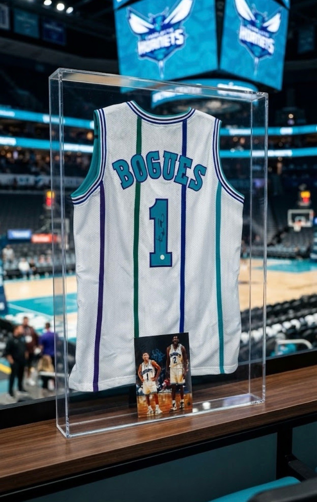 Muggsy Bogues Hornets Auto #1 Jersey W/ Dual Auto NBA Photo with Larry Johnson. Muggsy Bogues Hornets Auto #1 Jersey W/ Dual Auto NBA Photo with Larry Johnson.