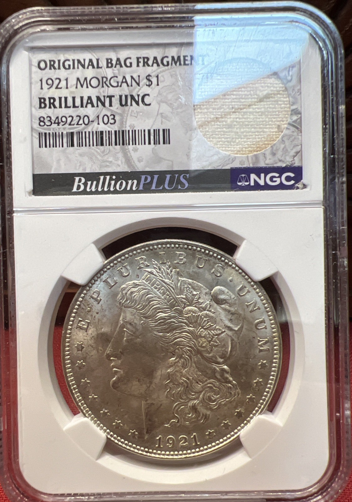 1921 P Morgan Dollar. NGC Brilliant UNC With Bag Fragment. Pretty Coin 1921 P Morgan Dollar. NGC Brilliant UNC With Bag Fragment. Pretty Coin