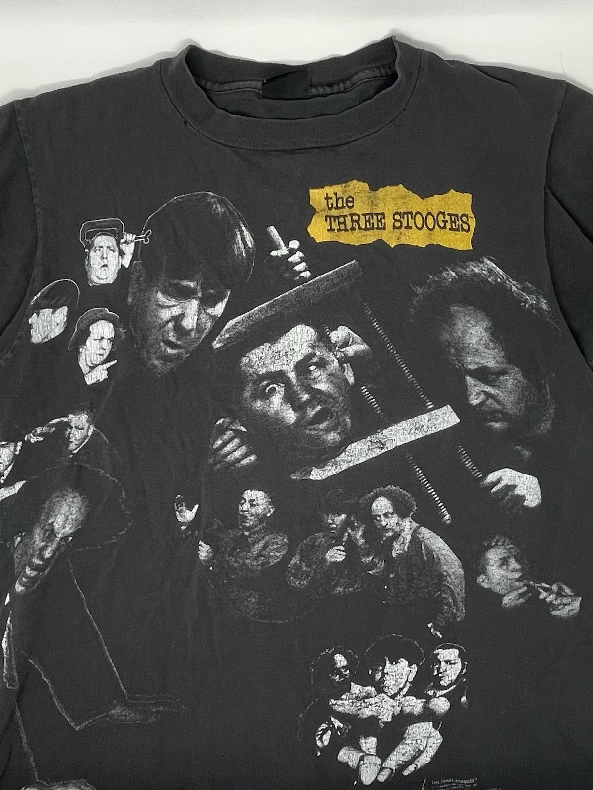 Vintage 1990s Three Stooges AOP Graphic Gray Changes Tag T Shirt (S/M)