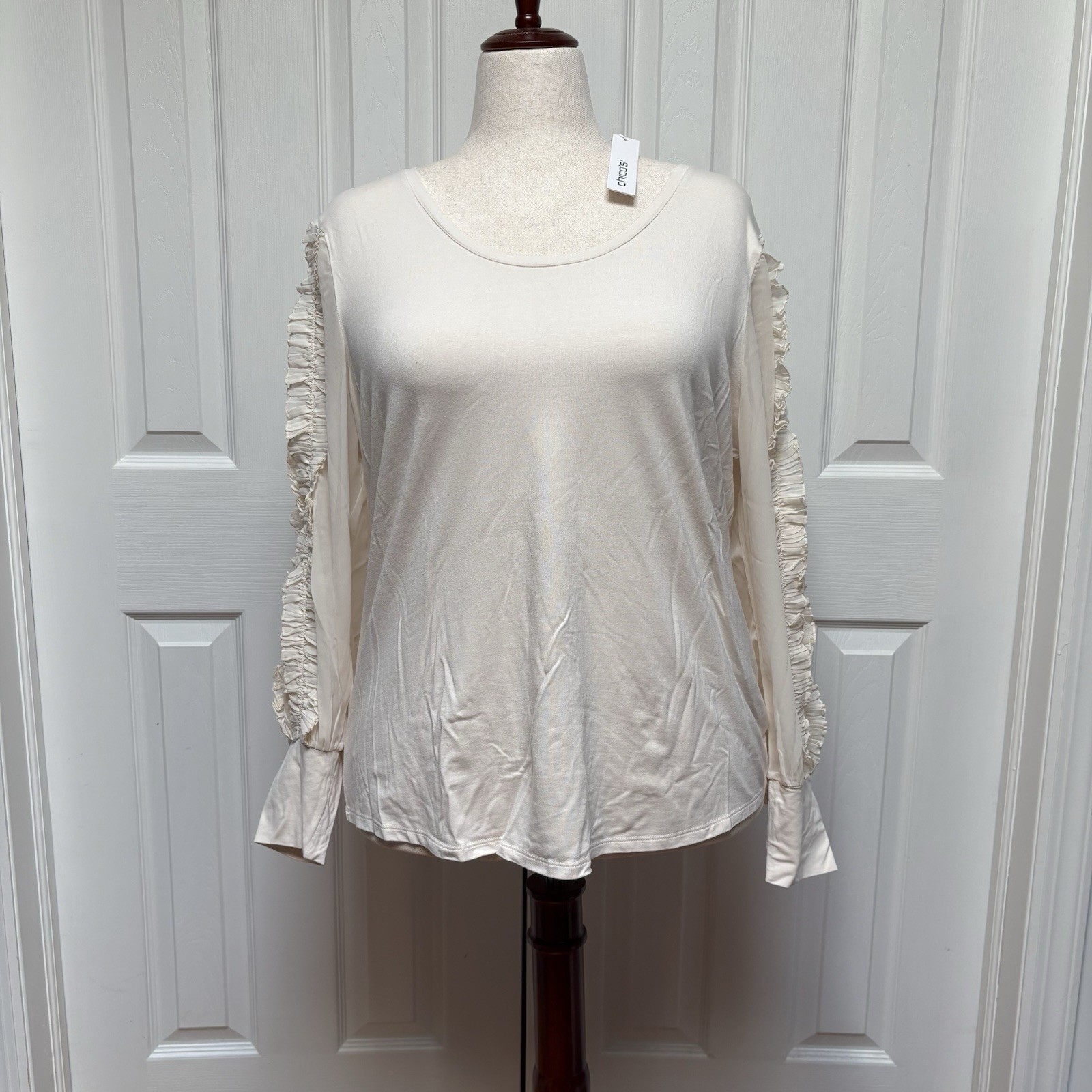 Chico’s Ruffle Sleeve, Ivory Colored Top, Size 3 Chico’s Ruffle Sleeve, Ivory Colored Top, Size 3