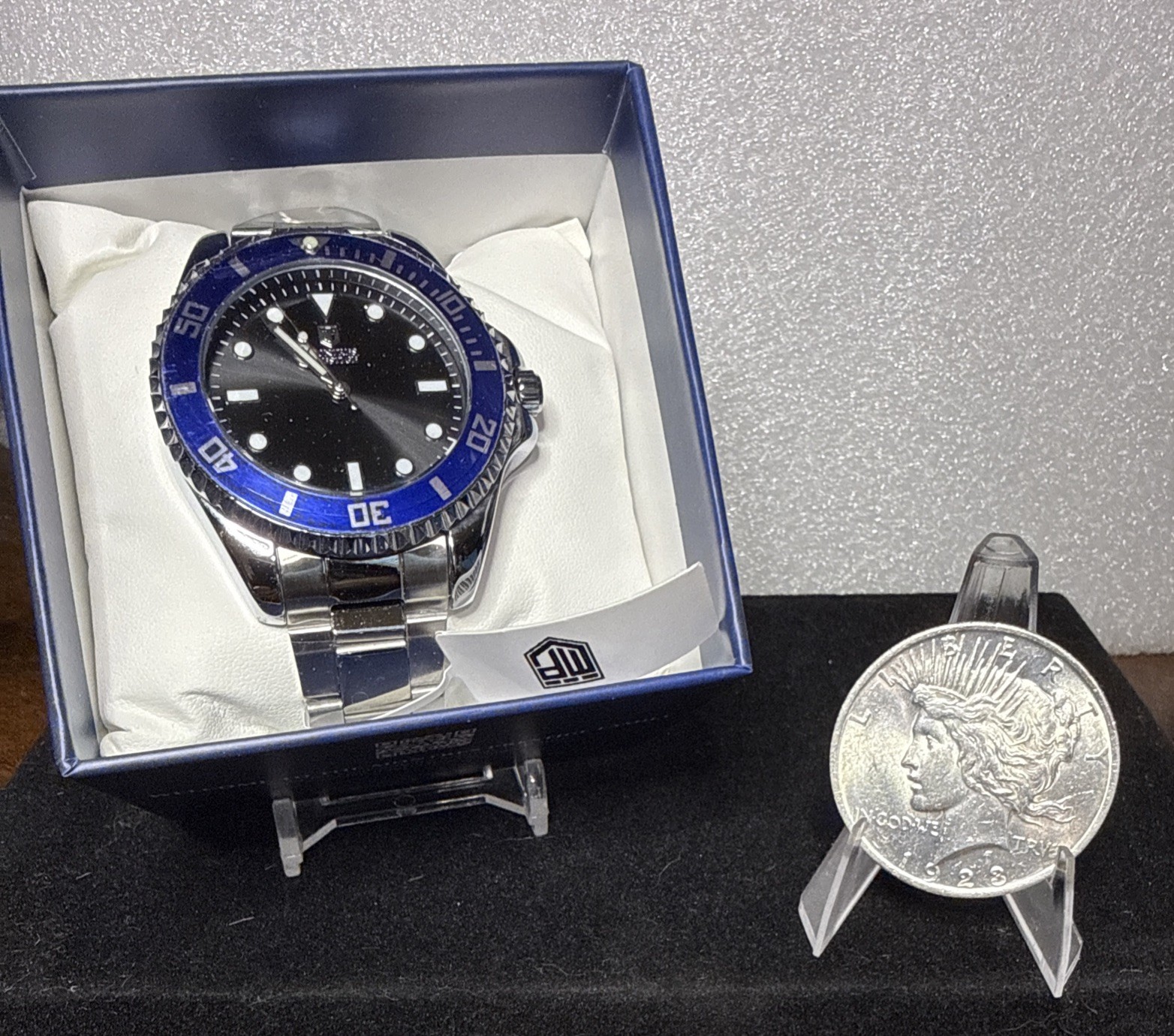 1923 UNC Silver Peace Dollar & A Brand New Montres Prestige Watch. *Shipping* 1923 UNC Silver Peace Dollar & A Brand New Montres Prestige Watch. *Shipping*
