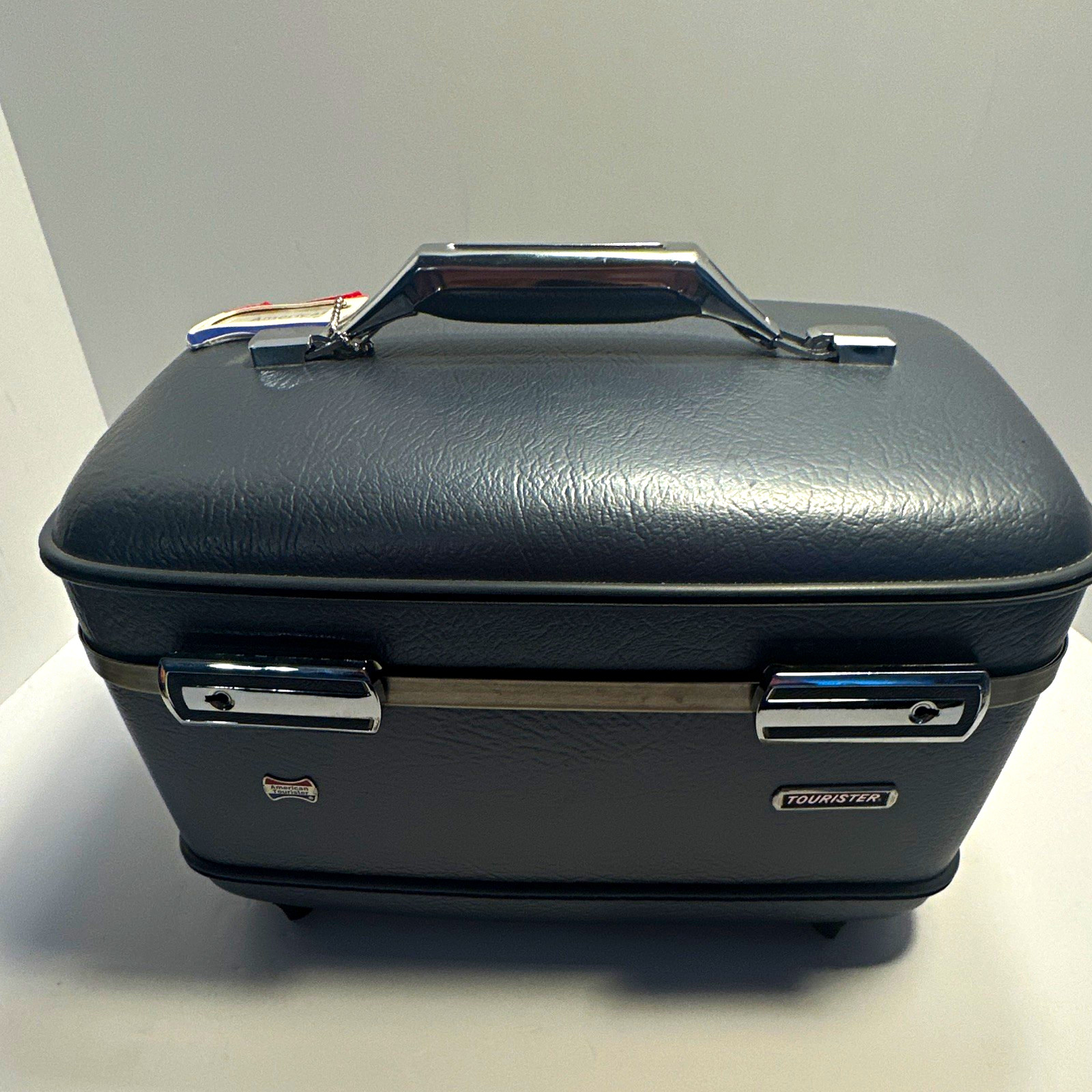 American Tourister Hardcase Train Case 14” and Under Vinyl Solid blue American Tourister Hardcase Train Case 14” and Under Vinyl Solid blue