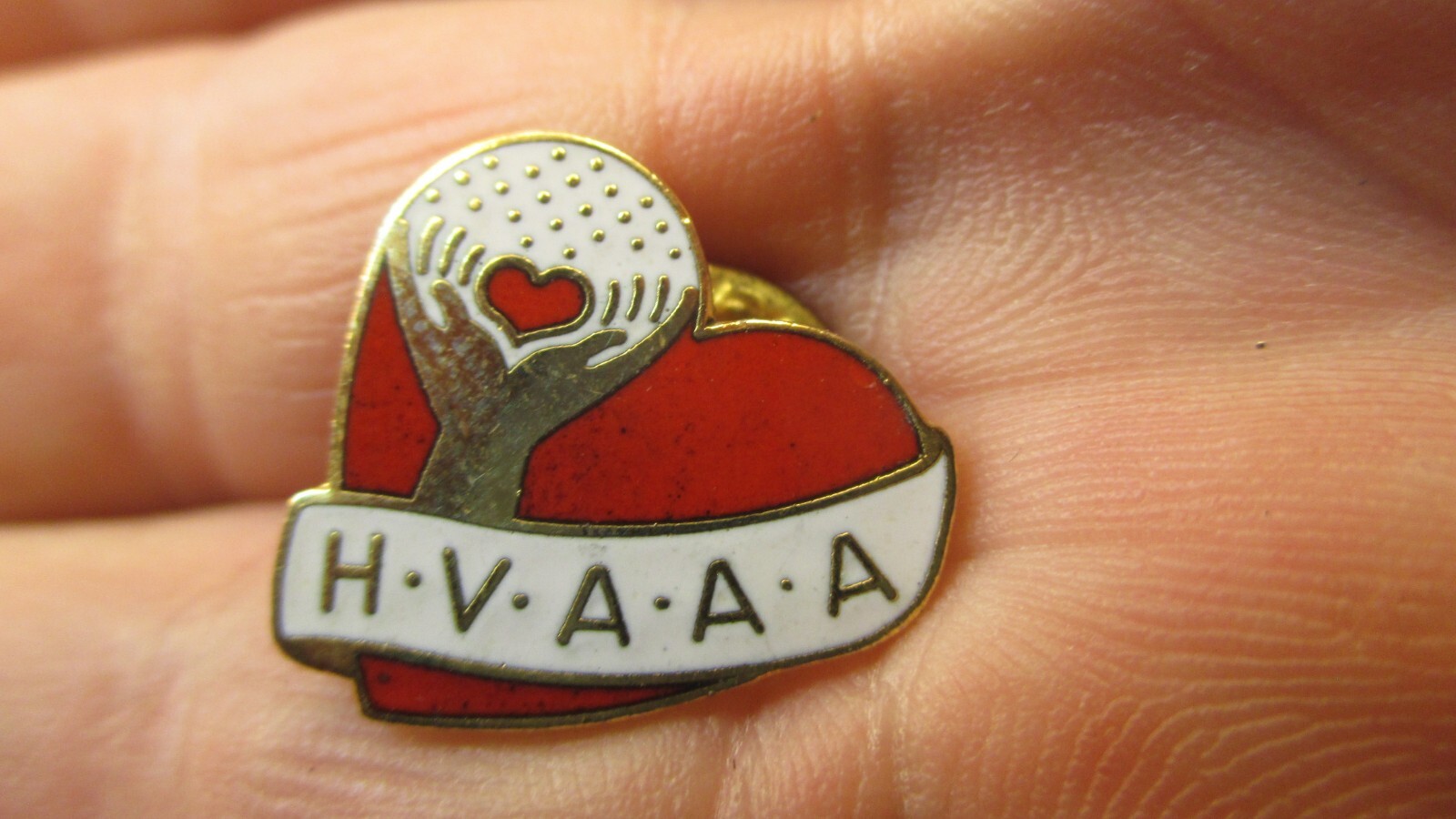 H.V.A.A.A. Pin Hawkeye Valley Area Agency on Aging Waterloo Iowa Red Heart Shape H.V.A.A.A. Pin Hawkeye Valley Area Agency on Aging Waterloo Iowa Red Heart Shape
