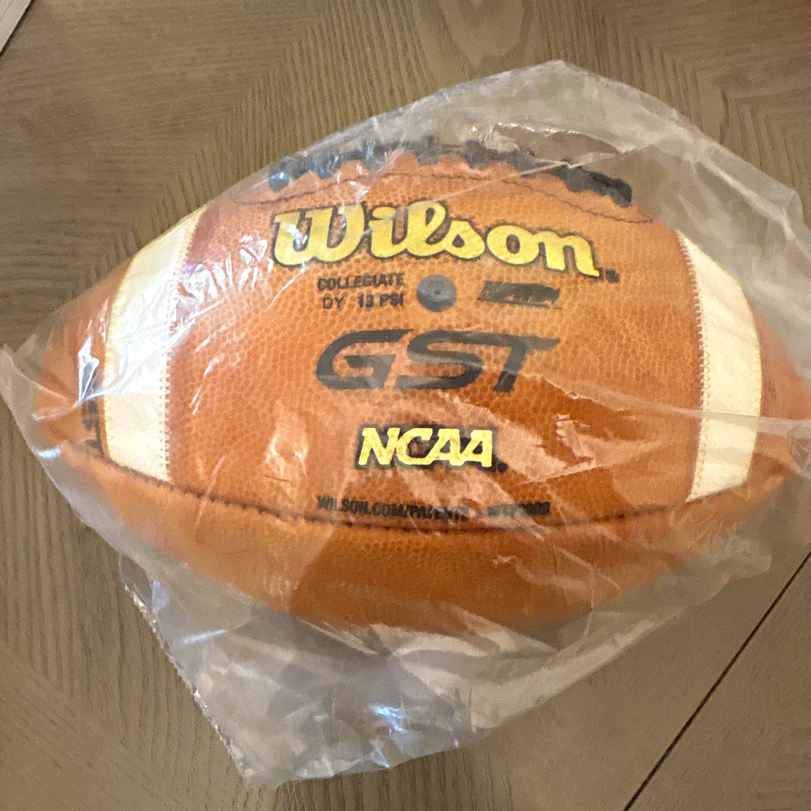 Wilson GST NCAA Leather Football Senior Size 9 Brown/White GST Product Line Wilson GST NCAA Leather Football Senior Size 9 Brown/White GST Product Line
