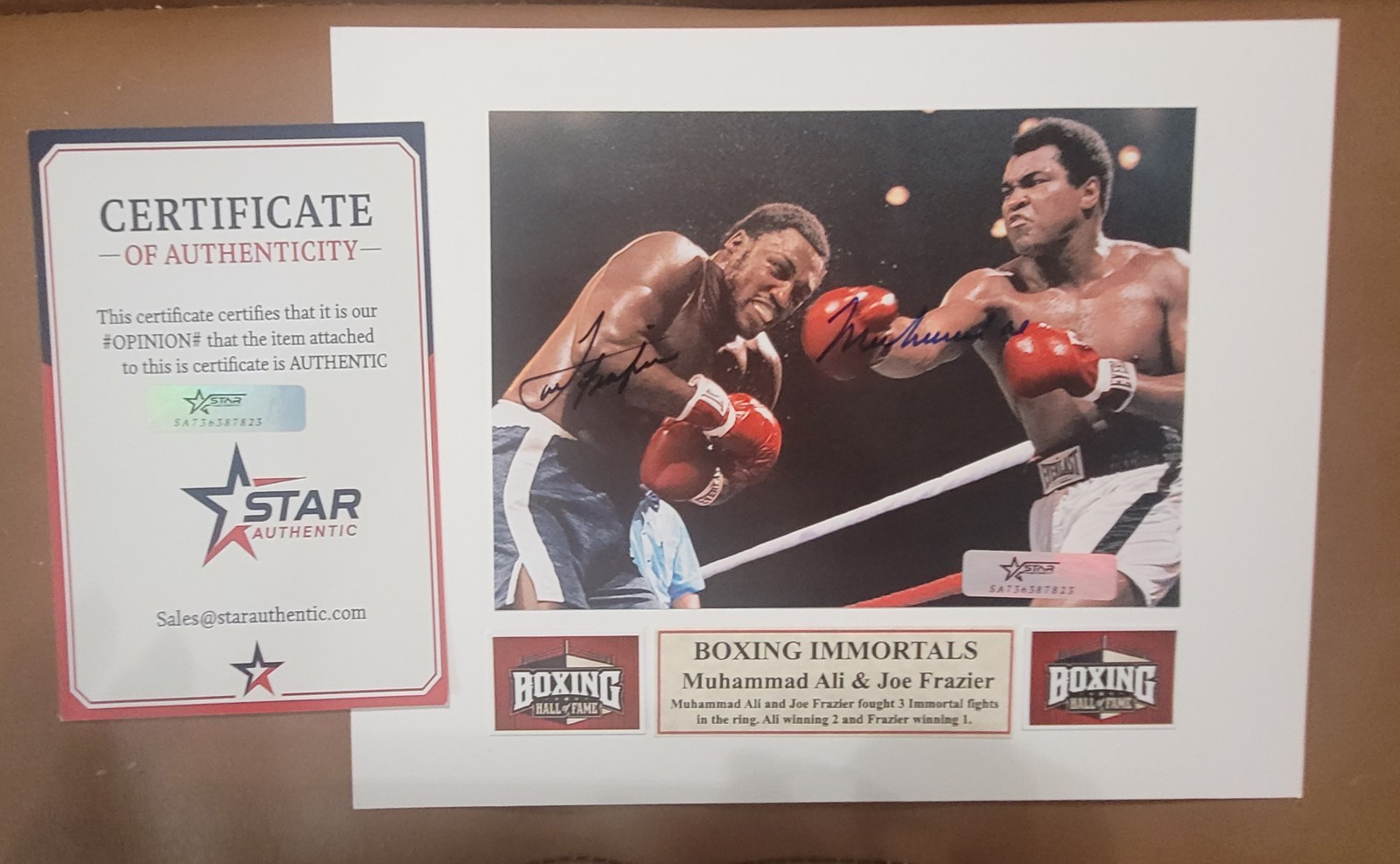 Muhammad Ali & Smokin JOE Frazier Autographed 4×6 Photo on 8x10 w/ Authenticity Muhammad Ali & Smokin JOE Frazier Autographed 4×6 Photo on 8x10 w/ Authenticity