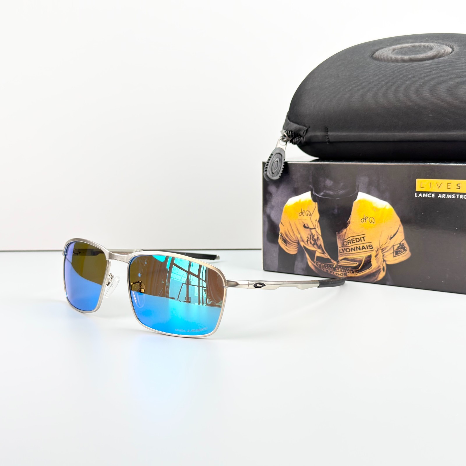 Oakley Conductor 8 OO4106 Sunglasses Silver Frame Sapphire Polarized Lens