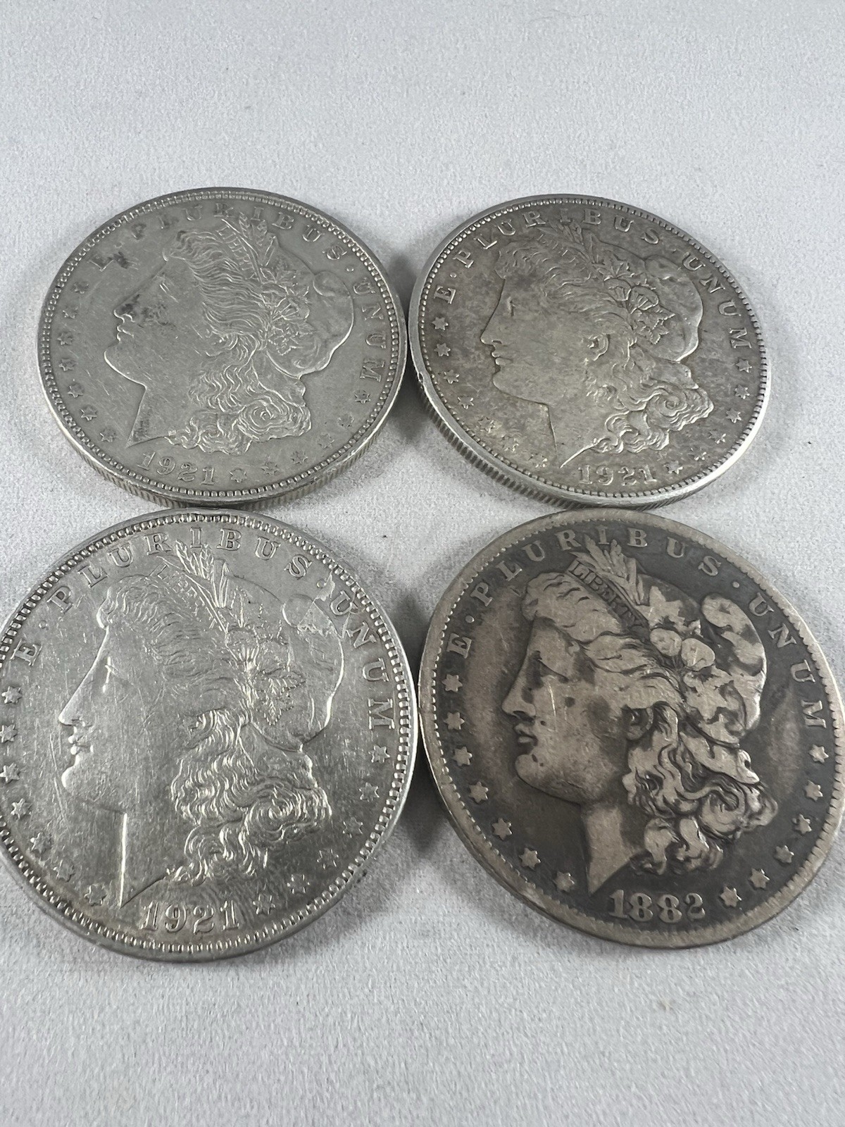 Lot of 4 Morgan Silver Dollars 1882-O & 3 1921-P 90% Silver Circulated