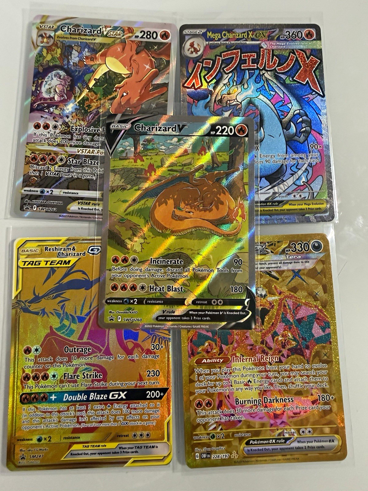 Charizard Mixed Card Lot (5) w/ Charizard VSTAR, Reshiram & Charizard GX, ex Charizard Mixed Card Lot (5) w/ Charizard VSTAR, Reshiram & Charizard GX, ex