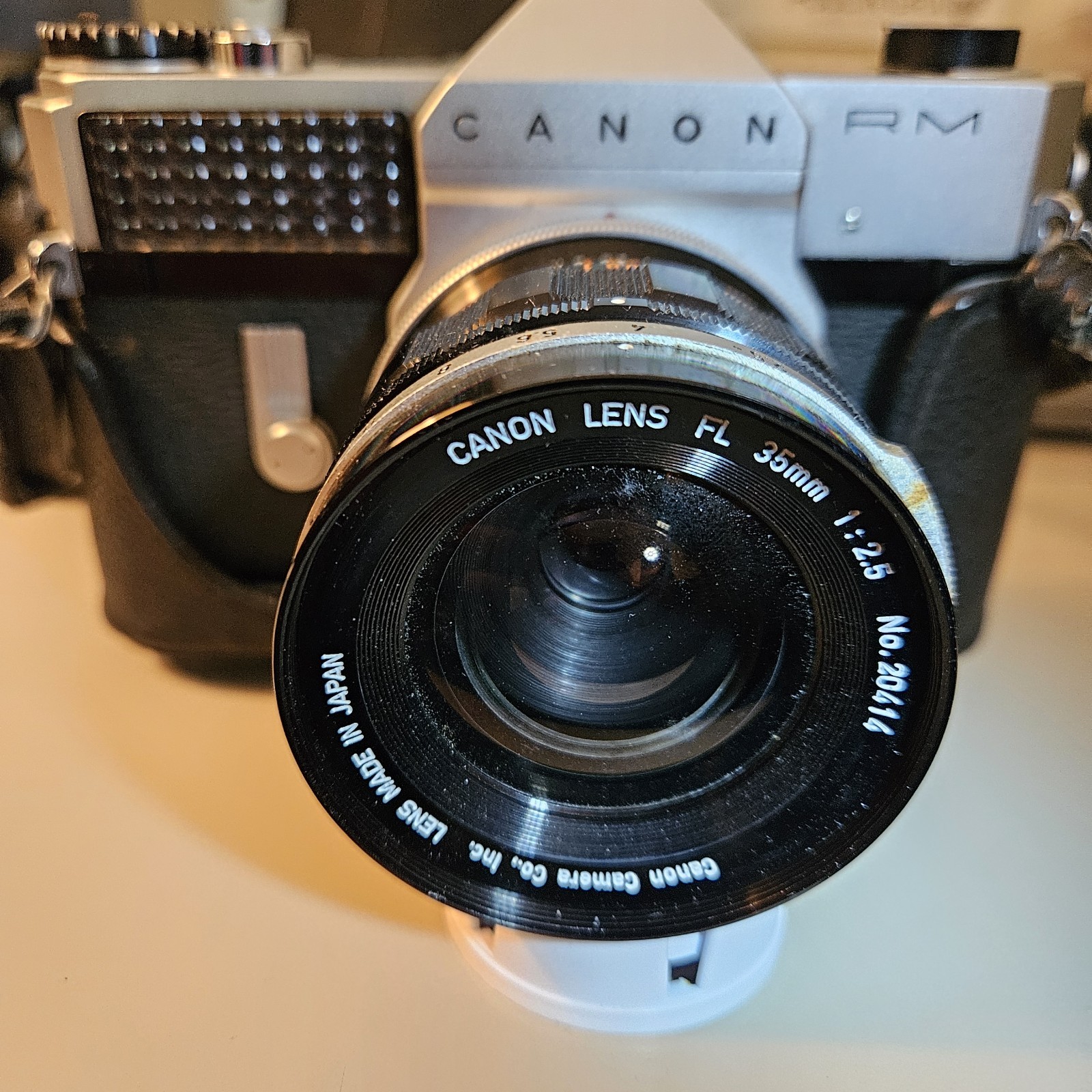 Vintage Canon Canonflex 35mm SLR with 35mm f2.8 lens, 1/2 Case and neck strap Vintage Canon Canonflex 35mm SLR with 35mm f2.8 lens, 1/2 Case and neck strap