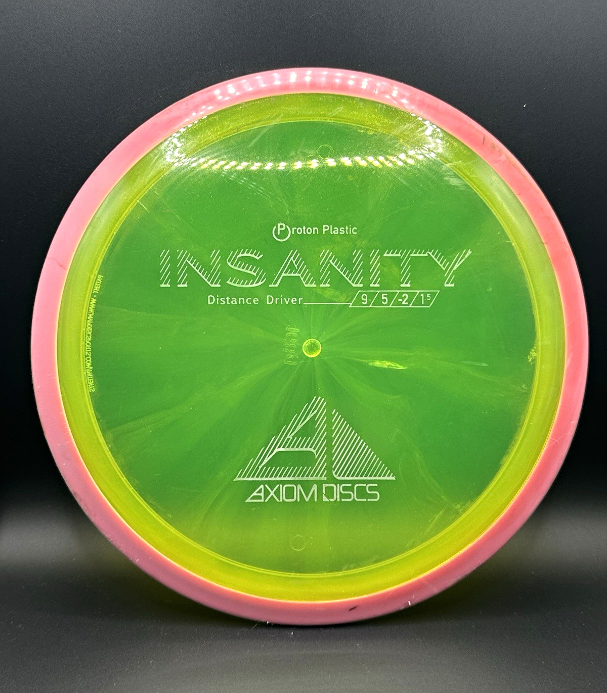 Axiom Discs Insanity Proton Distance Driver 168g Green/Pink Axiom Discs Insanity Proton Distance Driver 168g Green/Pink
