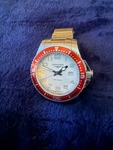 longines hydroconquest quartz red bezel L3.689.4