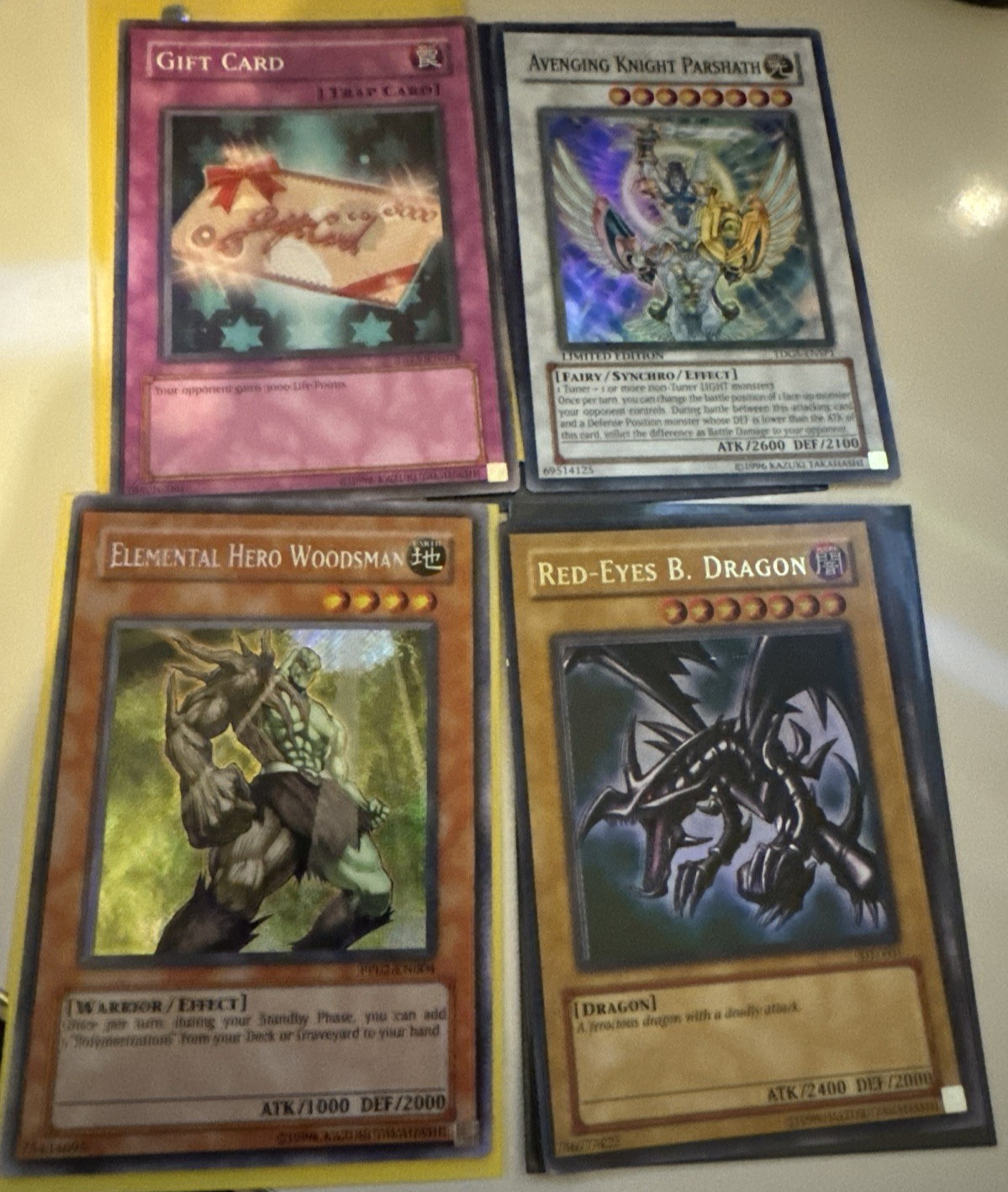 Red Eyes B. Dragon Avenging Knight Parshath Gift Card Elemental Hero Woodsman