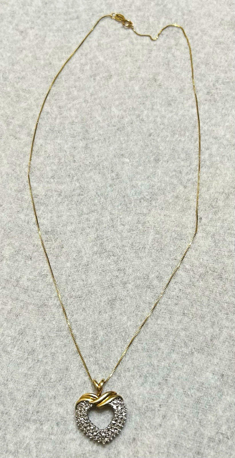 Vintage 10K gold necklace and .79 karat diamond pendant.