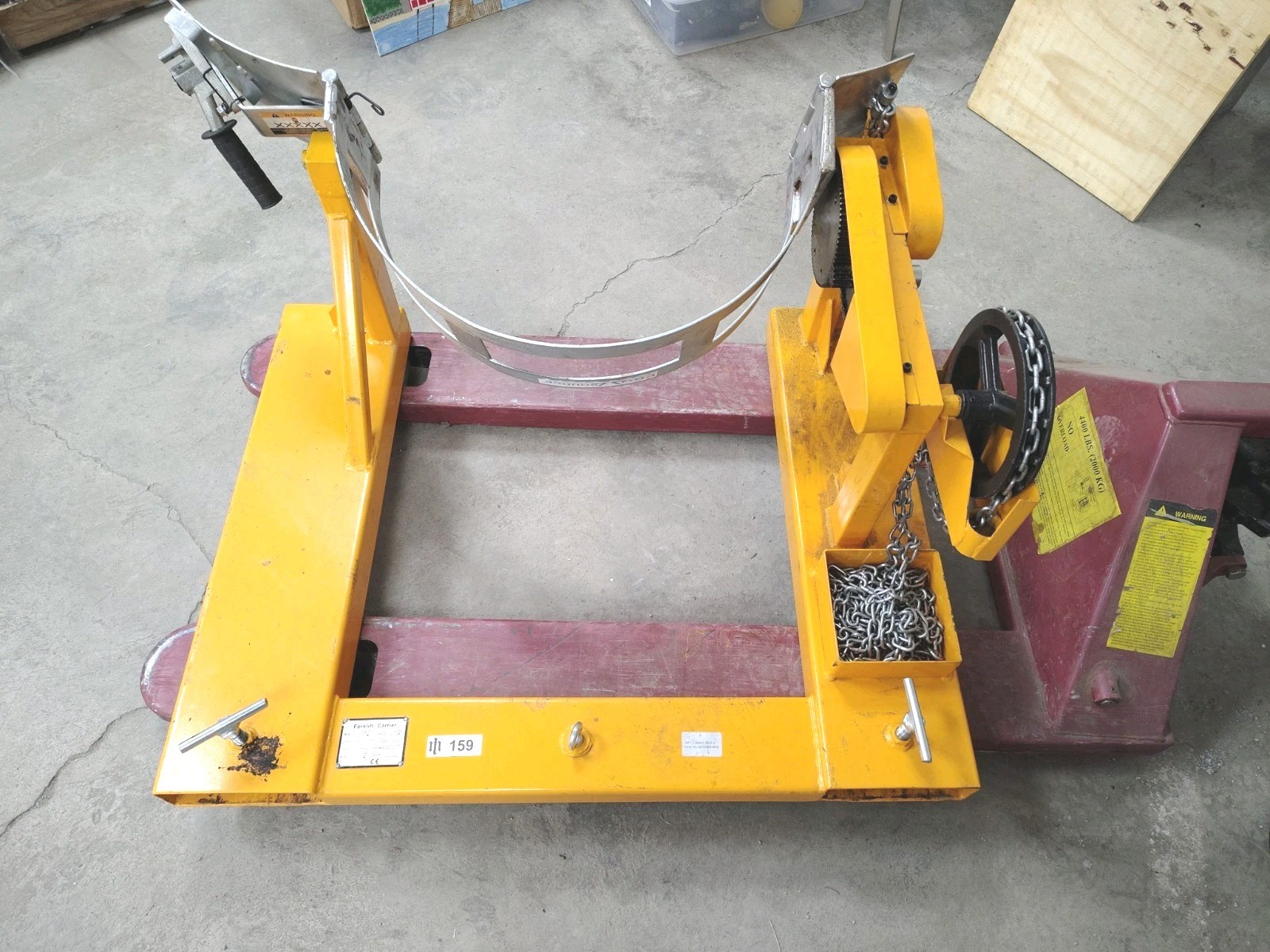 Forklift-Mounted 55-Gallon Drum Tilter (800LBS Capacity, Chain Wheel System) Forklift-Mounted 55-Gallon Drum Tilter (800LBS Capacity, Chain Wheel System)