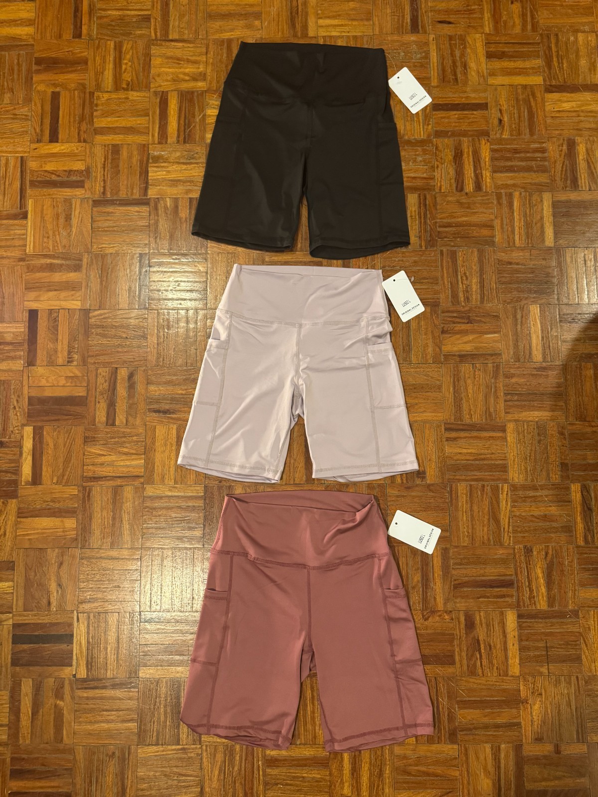 3 PAIR LULULEMON SHORTS WITH SIDE POCKETS ORIGINAL DESIGN WOMENS SIZE L 3 PAIR LULULEMON SHORTS WITH SIDE POCKETS ORIGINAL DESIGN WOMENS SIZE L