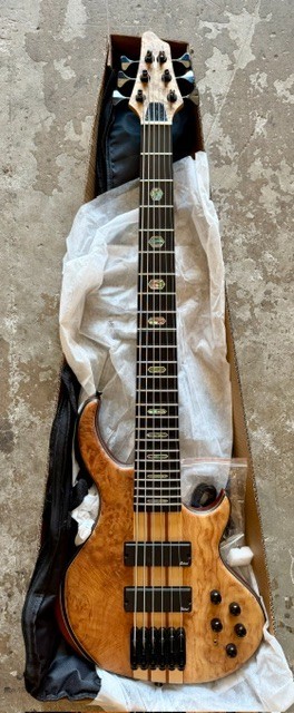 (Open Box Item) 6 String E. Bass Burl poplar top Millettia Laurentii Okoume body