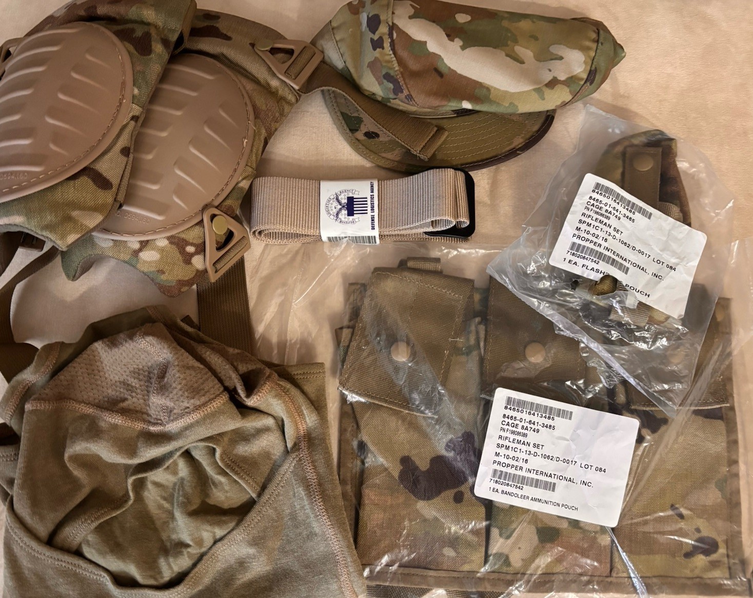 NEW USGI OCP Lot—incl Bandoleer Ammo Pouch, Flash Pouch, Kneepads, PC 7 1/2. etc NEW USGI OCP Lot—incl Bandoleer Ammo Pouch, Flash Pouch, Kneepads, PC 7 1/2. etc