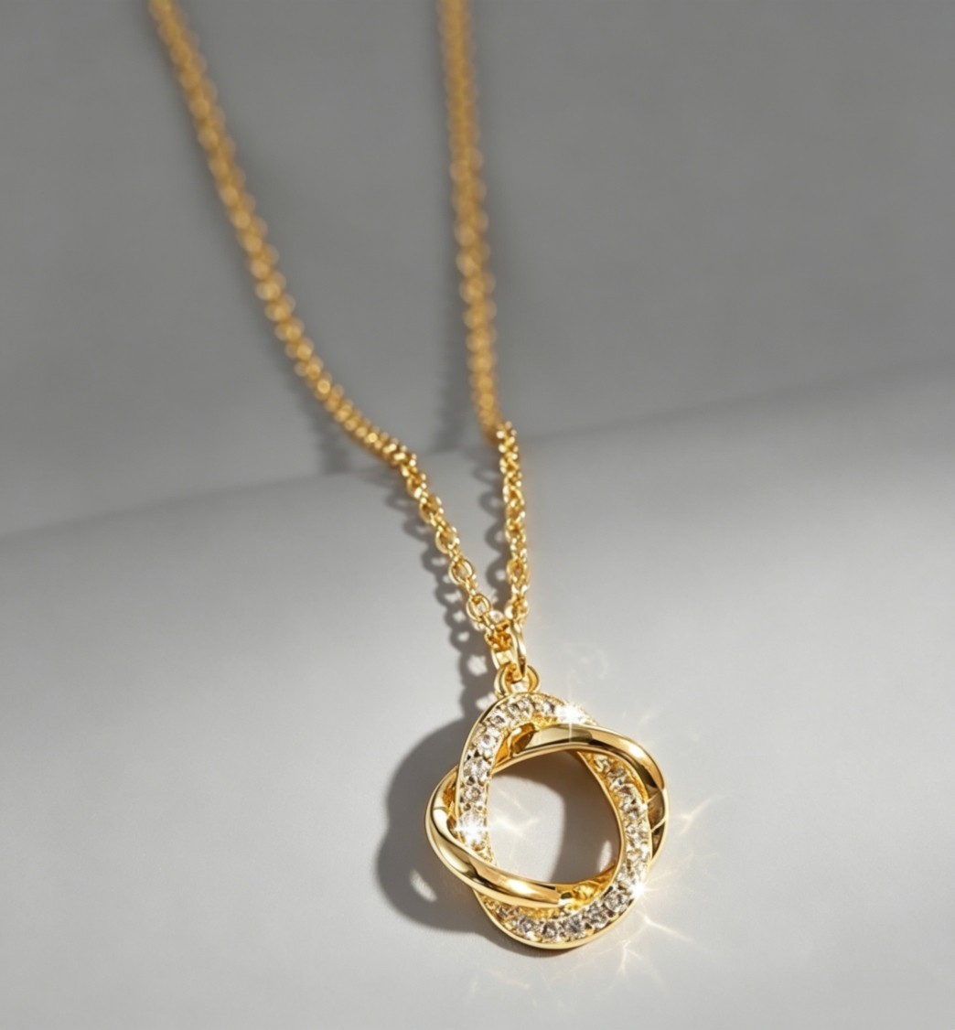 Elegant Gold Tone Knot Pendant Oval Chain Necklace with CZ Pave for Daily Wear Elegant Gold Tone Knot Pendant Oval Chain Necklace with CZ Pave for Daily Wear