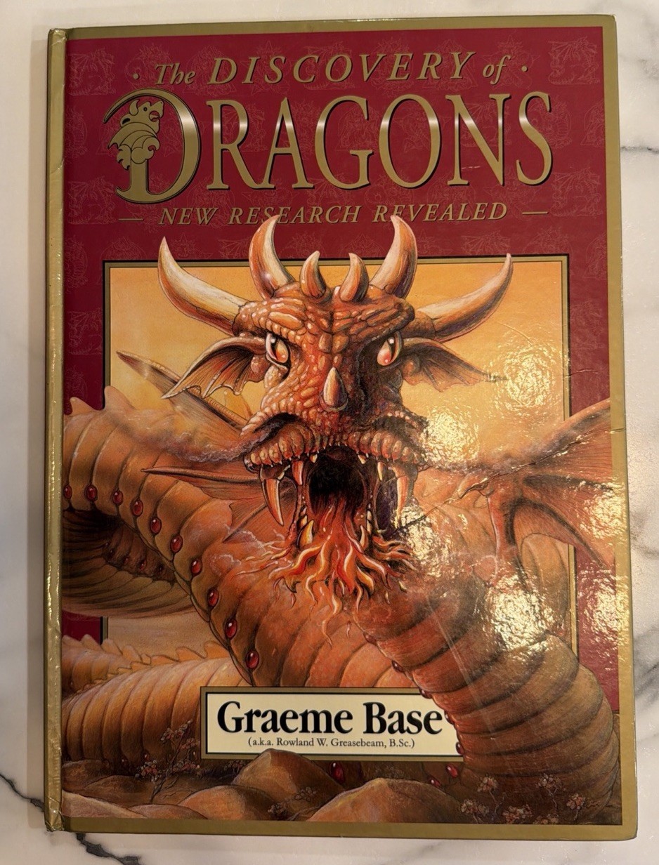 THE DISCOVERY OF DRAGONS New Research Revealed Graeme Base 2007 HBDJ VGC L1