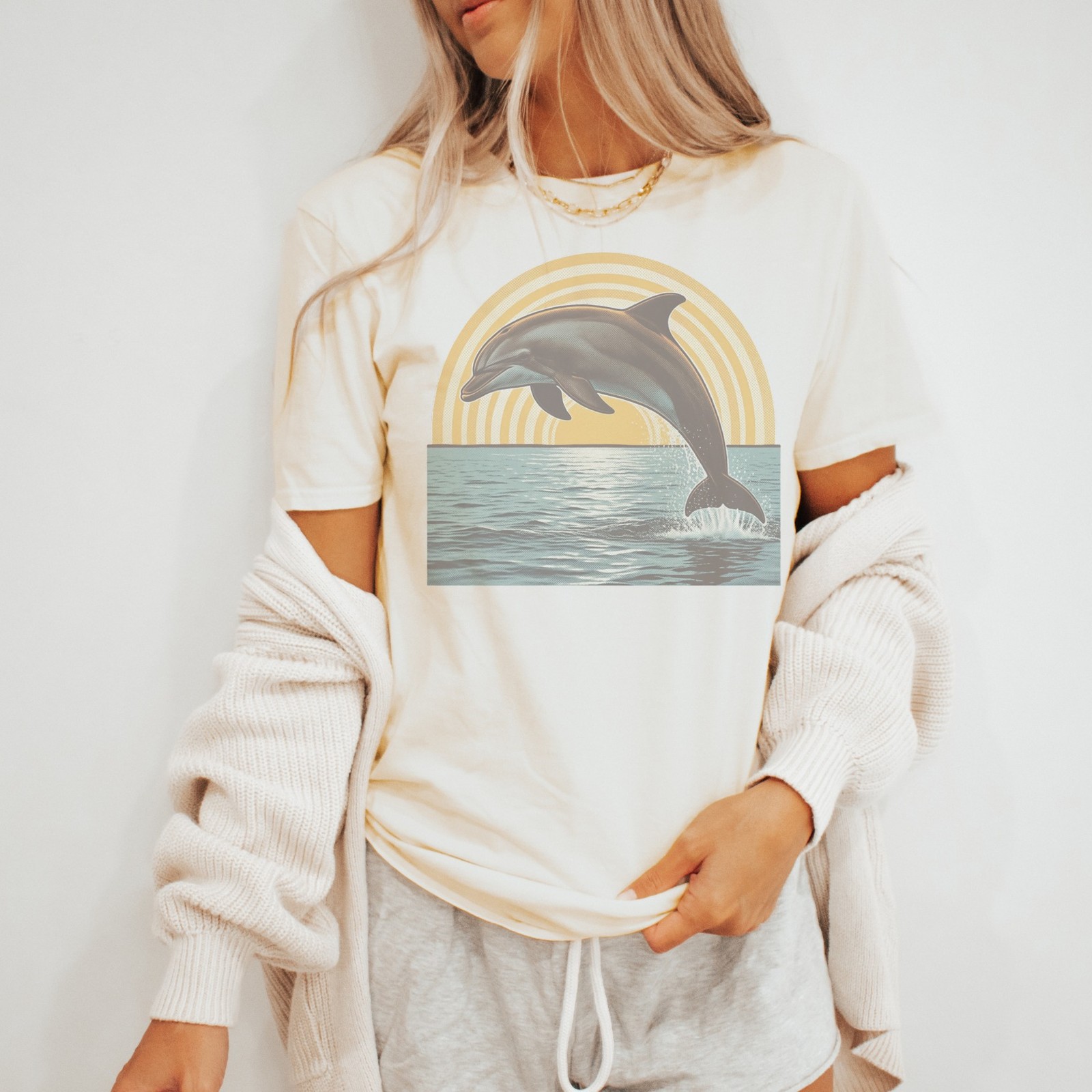 Dolphin Leaping Through a Halftone Sunburst Tee