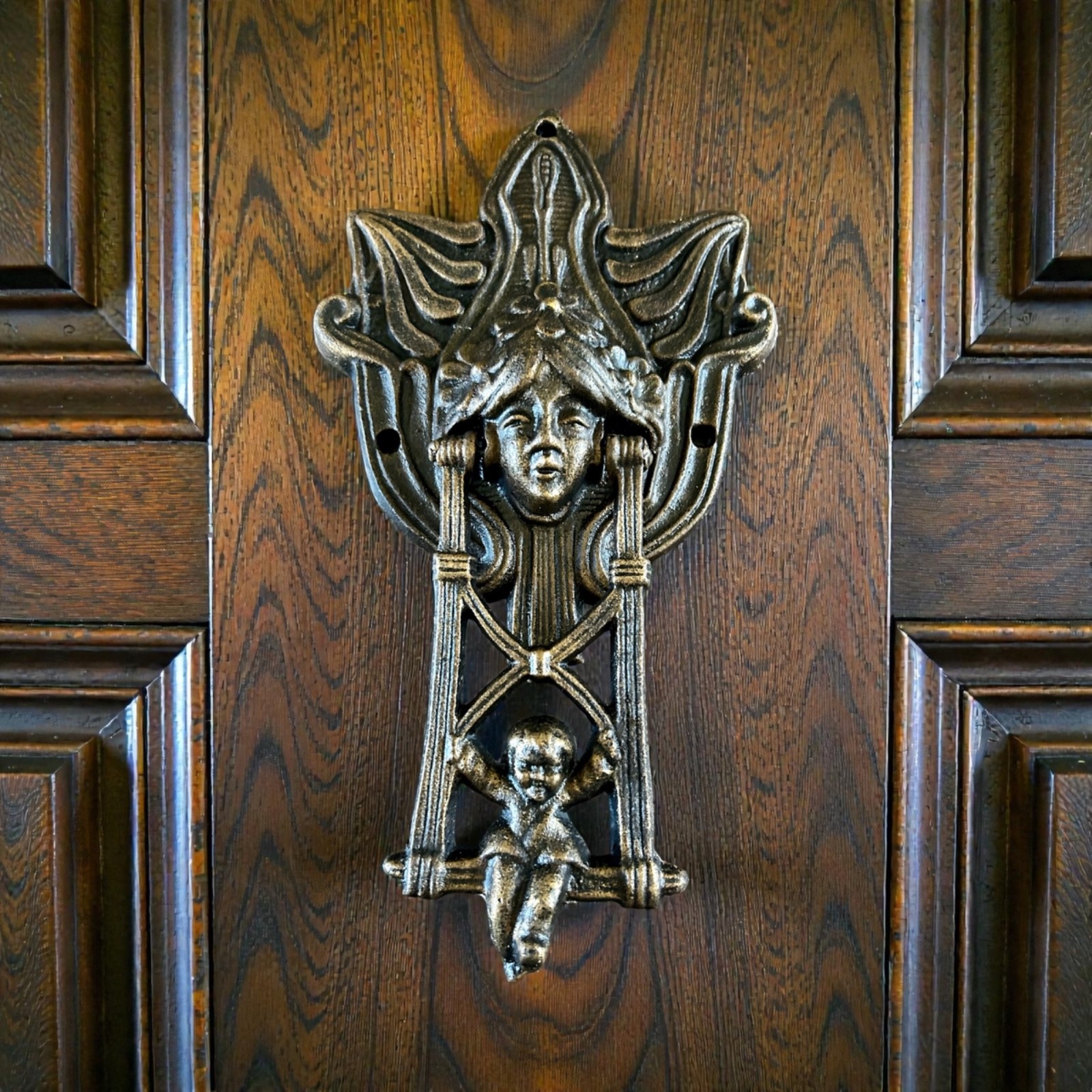 Art Nouveau Cast Iron Door Knocker – Vintage Female Mask & Cherub on Swing Art Nouveau Cast Iron Door Knocker – Vintage Female Mask & Cherub on Swing