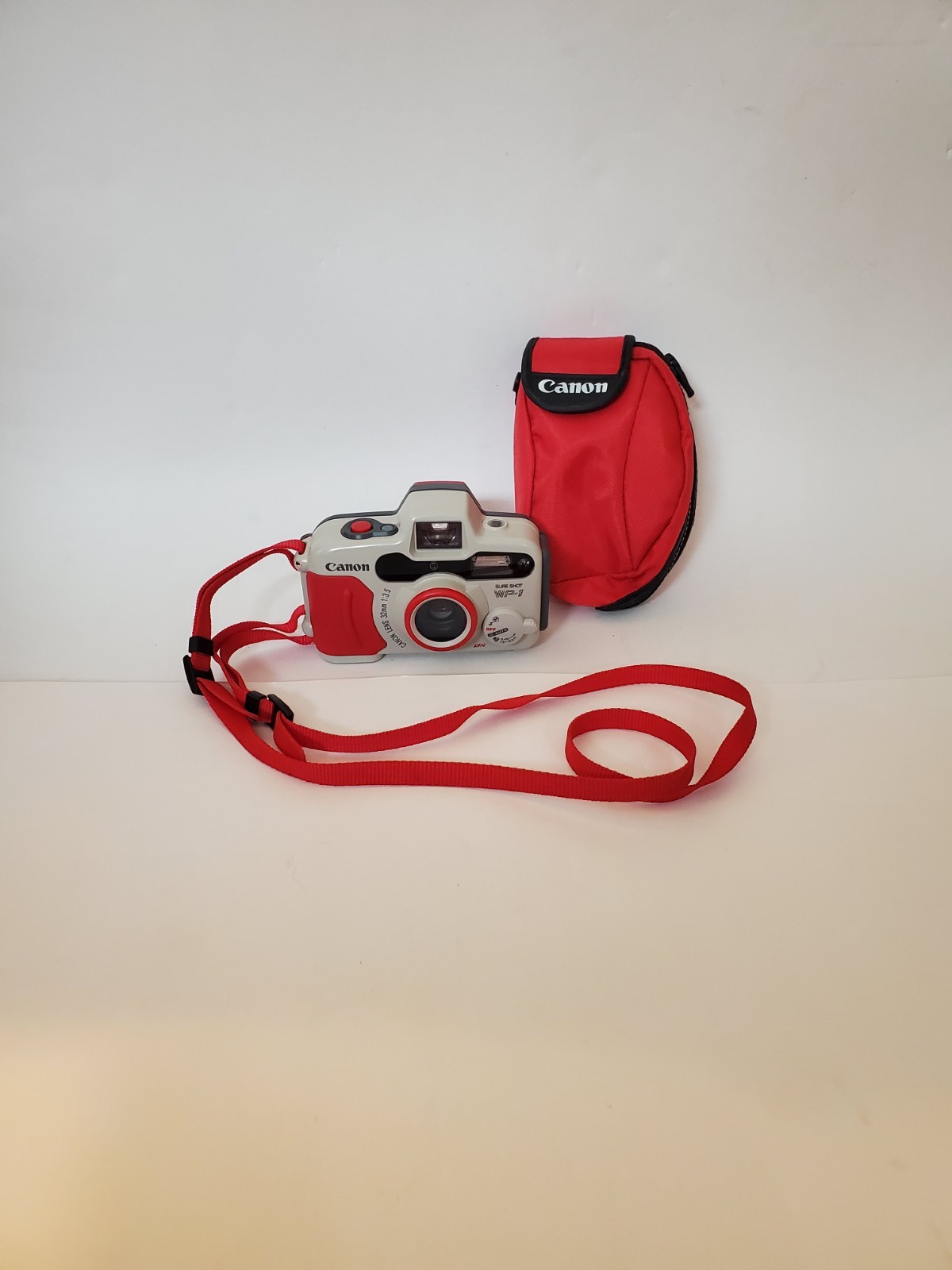 Vintage Canon Sure Shot WP-1 35mm Point & Shoot Film Camera w/ Case & Lanyard Vintage Canon Sure Shot WP-1 35mm Point & Shoot Film Camera w/ Case & Lanyard