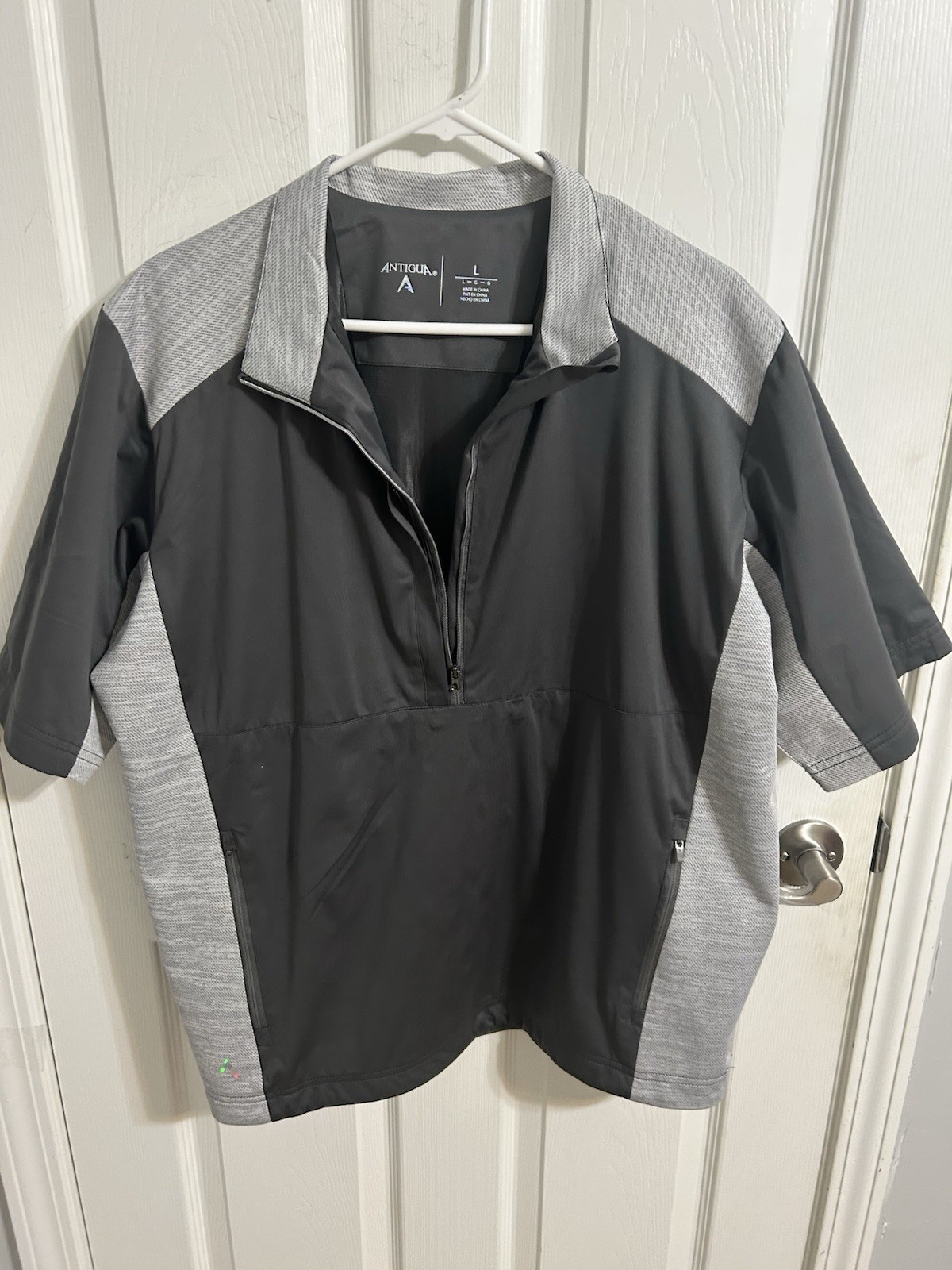 Antigua men’s L short sleeve 1/4 Zip Golf jacket, excellent Condition Antigua men’s L short sleeve 1/4 Zip Golf jacket, excellent Condition