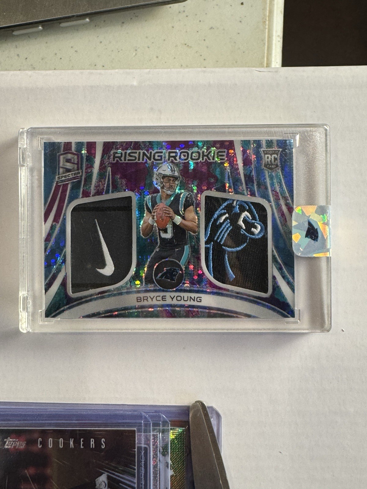 Bryce Young Spectra Rising Rookie RC Dual Patch 38/75 Nike Swoosh & Panther Logo Bryce Young Spectra Rising Rookie RC Dual Patch 38/75 Nike Swoosh & Panther Logo