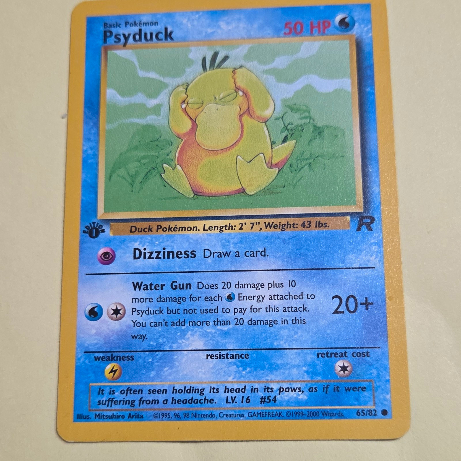 Wizards of the Coast Psyduck 65/82 Team Rocket 1st Edition Regular Common EN