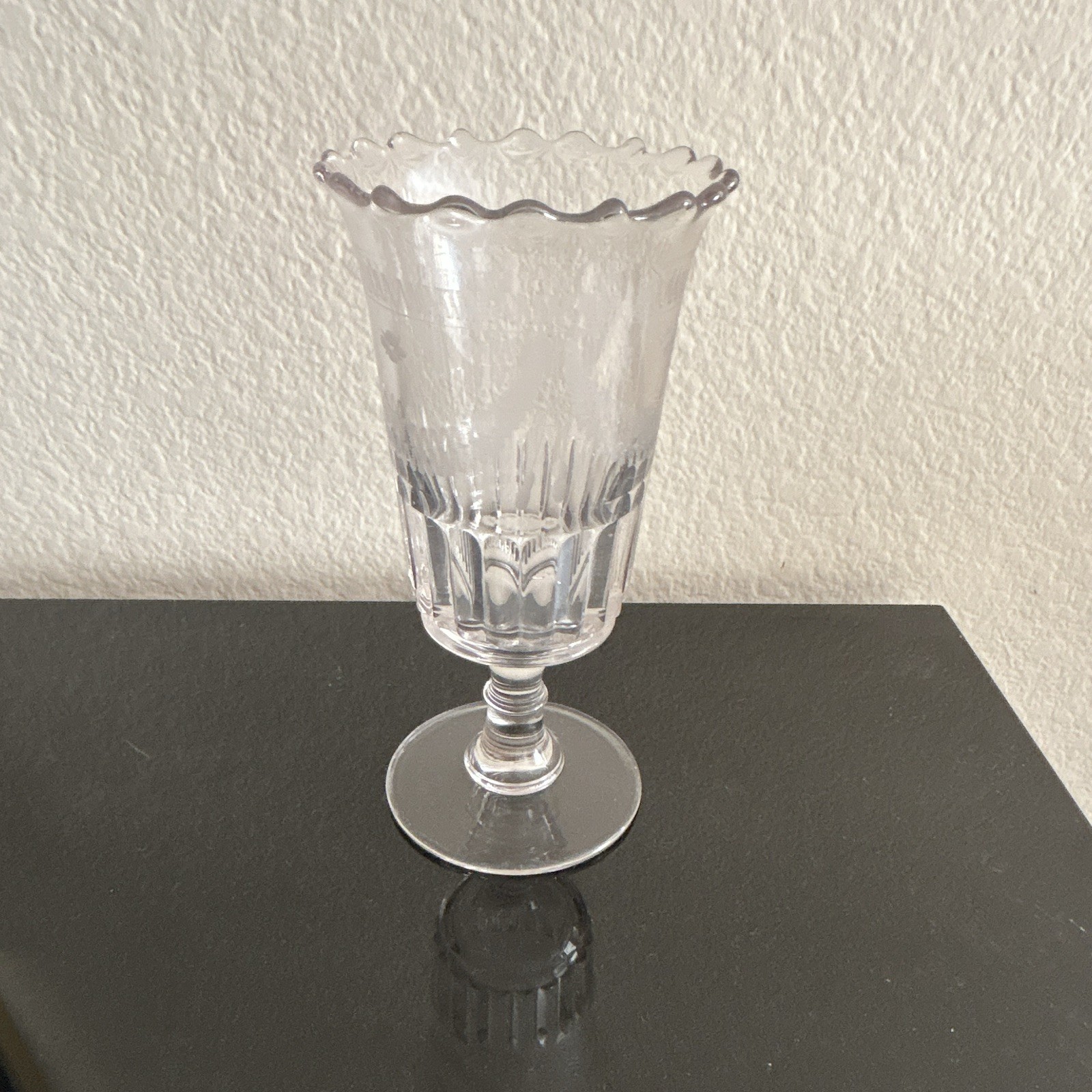 an antique 19th-century etched or cut glass celery vase