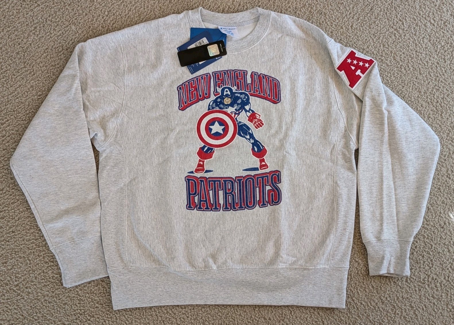 New England Patriots Disney x Champion Captain America Reverse Weave Sweatshirt