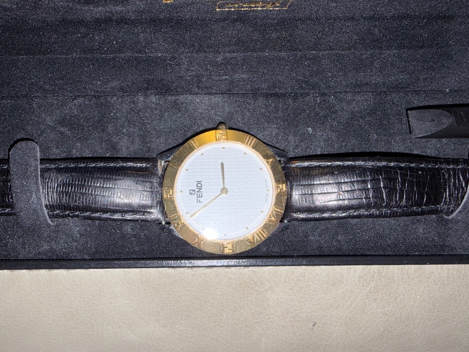 Fendi watch with white face extra gold basil, and it has box. No papers really g Fendi watch with white face extra gold basil, and it has box. No papers really g