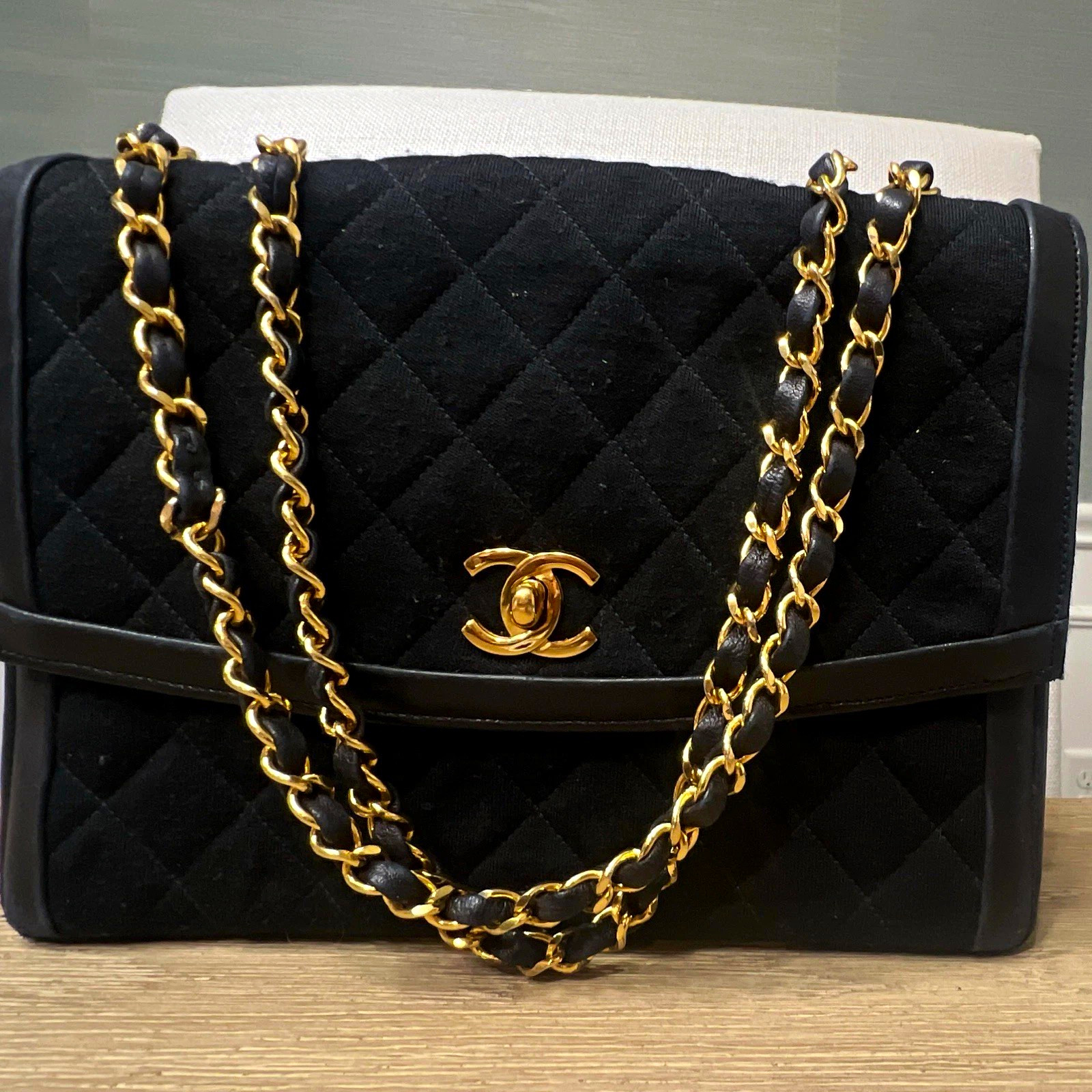 Vintage CHANEL 1985 Black Quilted Jersey Flap Bag 24K Gold Chain Authenticated Vintage CHANEL 1985 Black Quilted Jersey Flap Bag 24K Gold Chain Authenticated