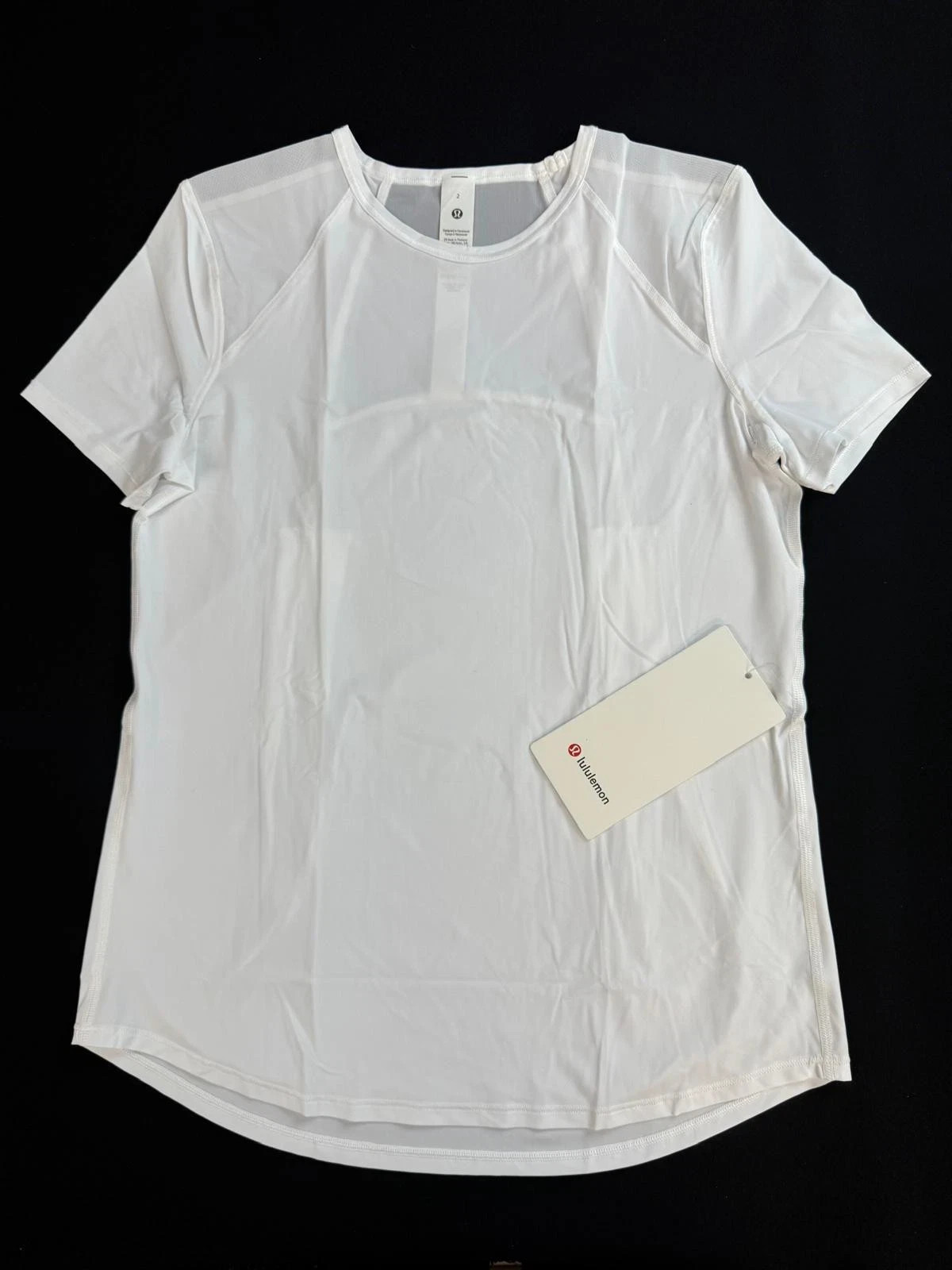 lululemon Sculpt Short-Sleeve Shirt Classic Fit, Hip Length. White. Size 2. NWT lululemon Sculpt Short-Sleeve Shirt Classic Fit, Hip Length. White. Size 2. NWT