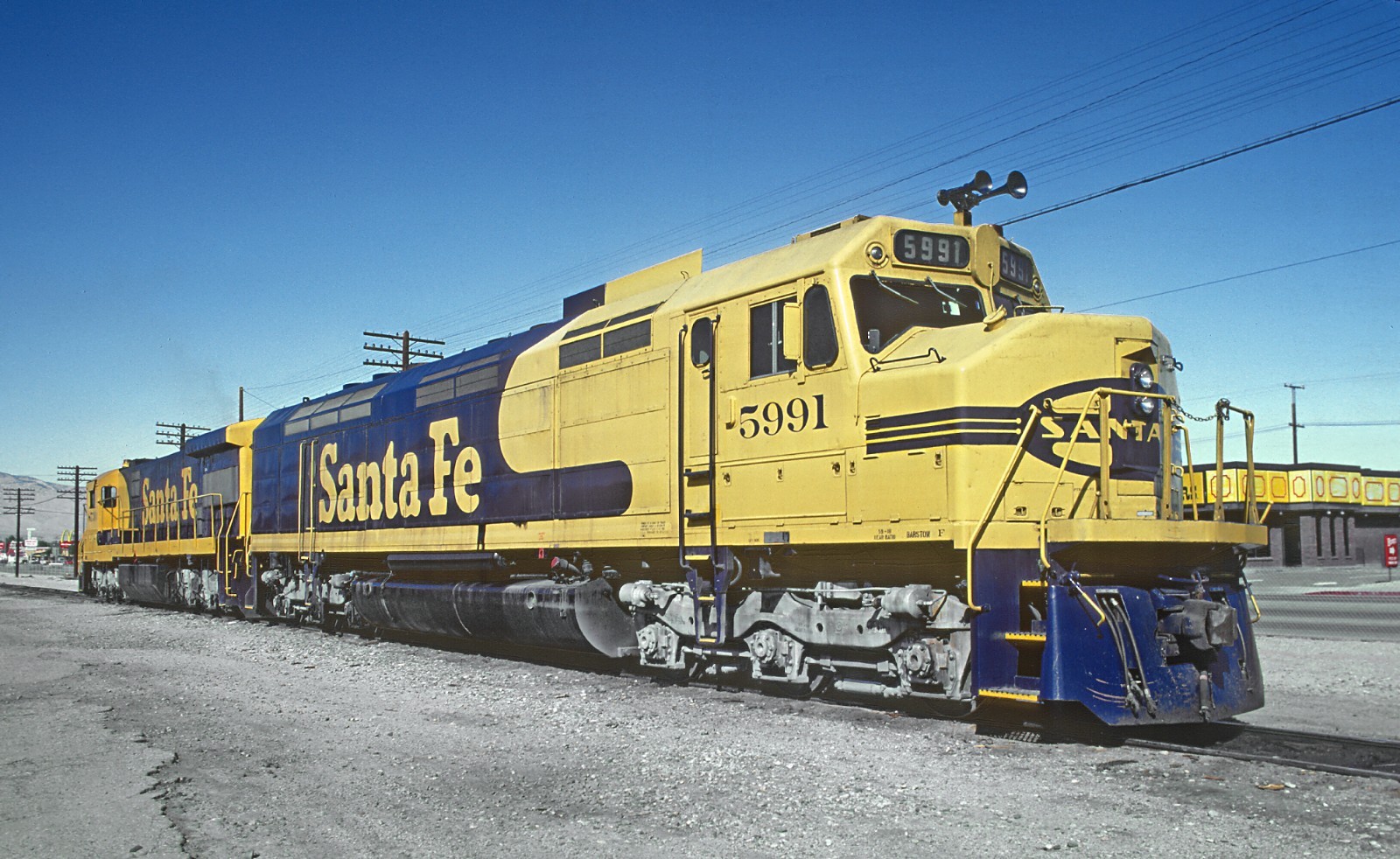 AT&SF FP45u 5991 and U36C 8730 in Mojave, CA in Oct 1983 8.5 x 11 Photo AT&SF FP45u 5991 and U36C 8730 in Mojave, CA in Oct 1983 8.5 x 11 Photo