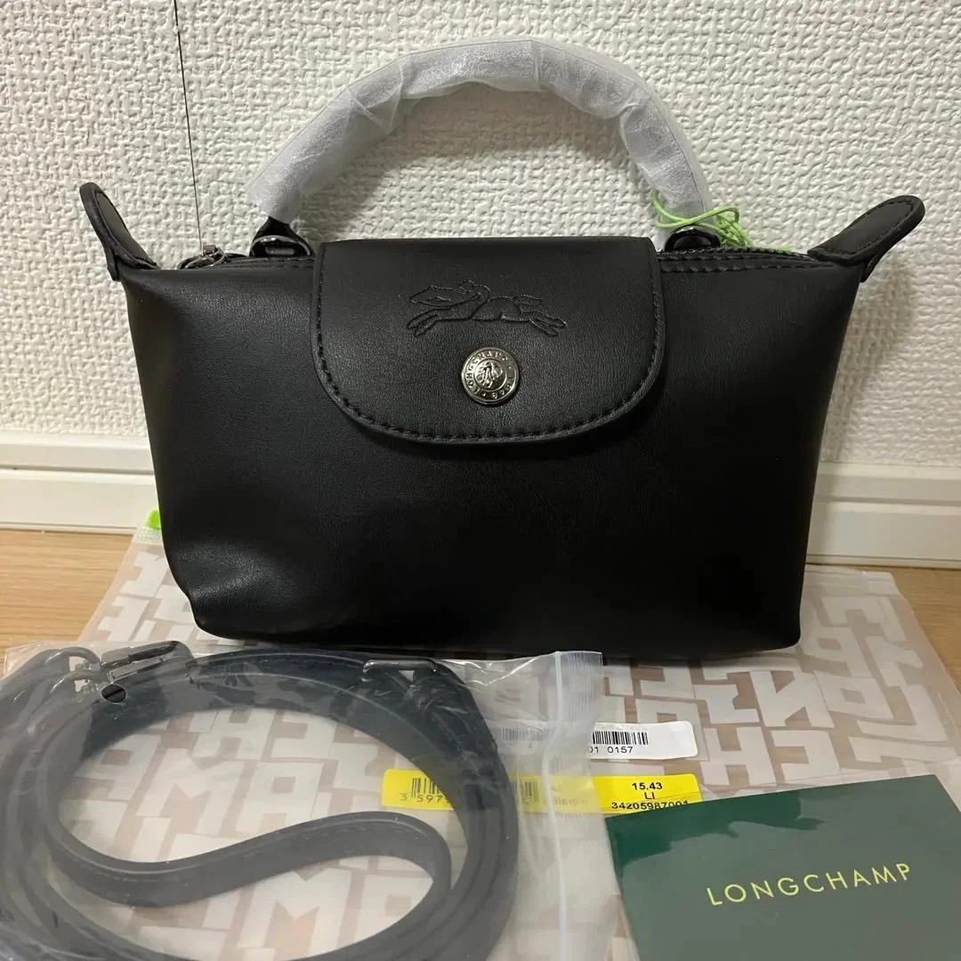 NWT Longchamp Le Pliage Xtra XS Leather Pouch Crossbody Bag Dust Bag Black NWT Longchamp Le Pliage Xtra XS Leather Pouch Crossbody Bag Dust Bag Black